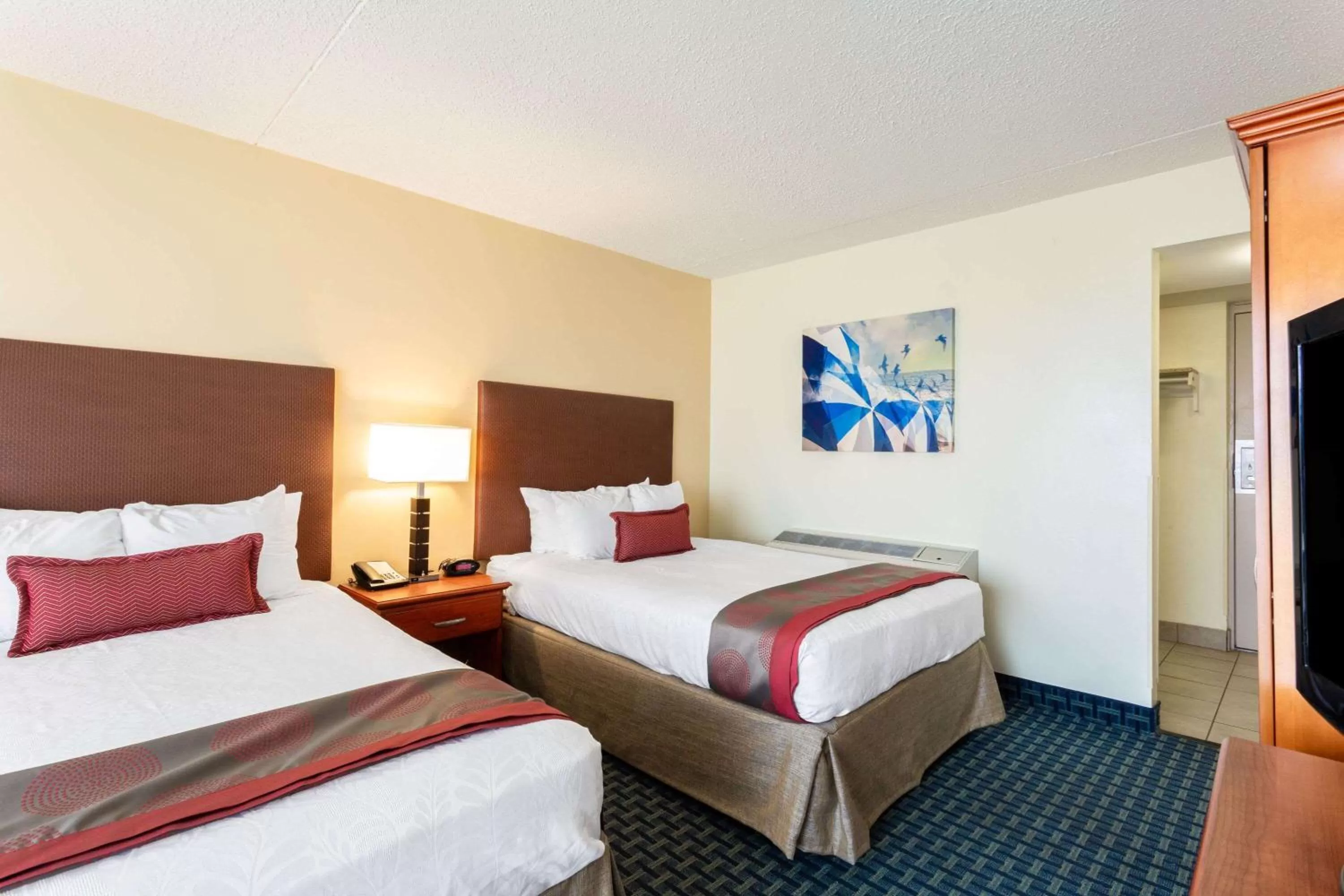 Photo of the whole room, Bed in Ramada Plaza by Wyndham Virginia Beach Oceanfront