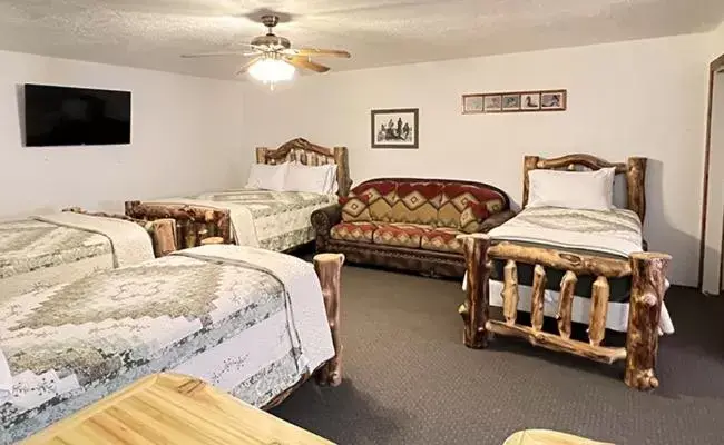 Photo of the whole room, Bed in THE SNUGGLE INN