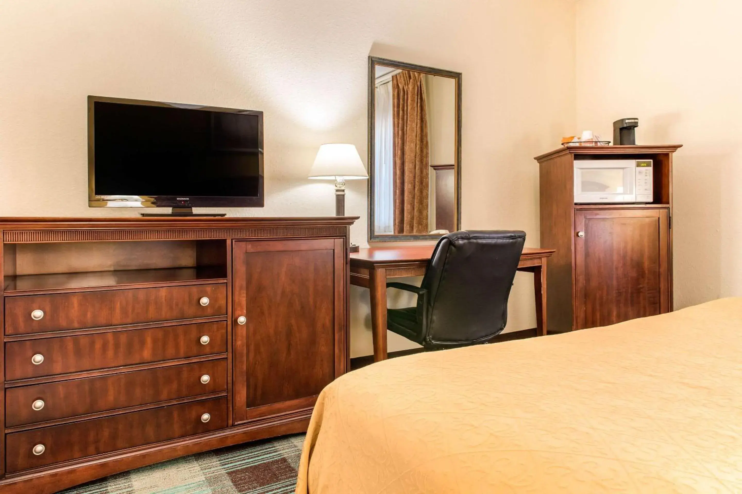 Photo of the whole room, TV/Entertainment Center in Quality Inn & Suites Miamisburg - Dayton South