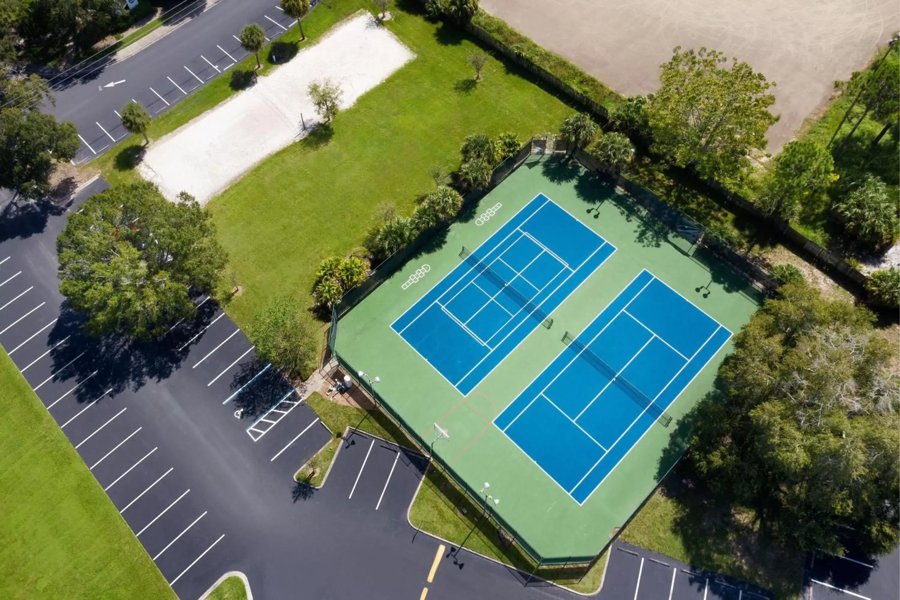 Tennis court, Bird's-eye View in Delta Hotels by Marriott Orlando Celebration - Newly Renovated!