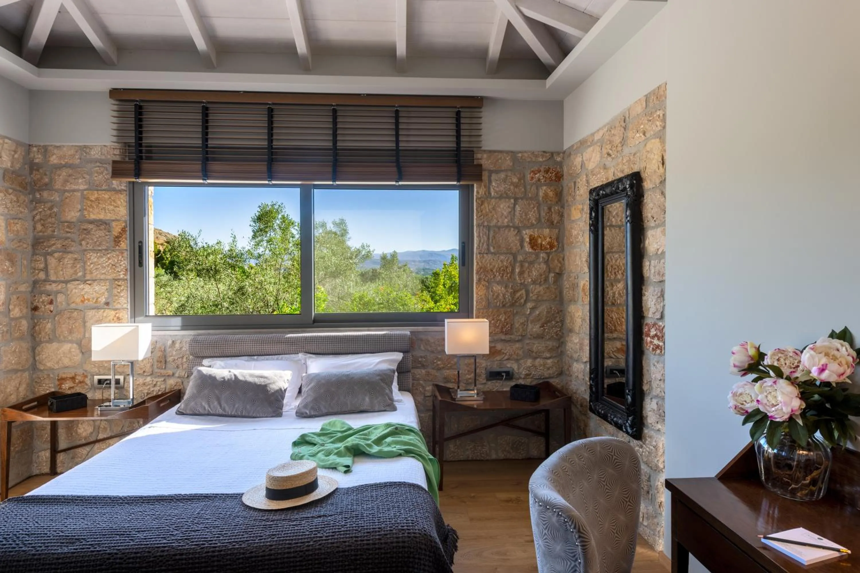 Bed in Anthemion Suites and Villas