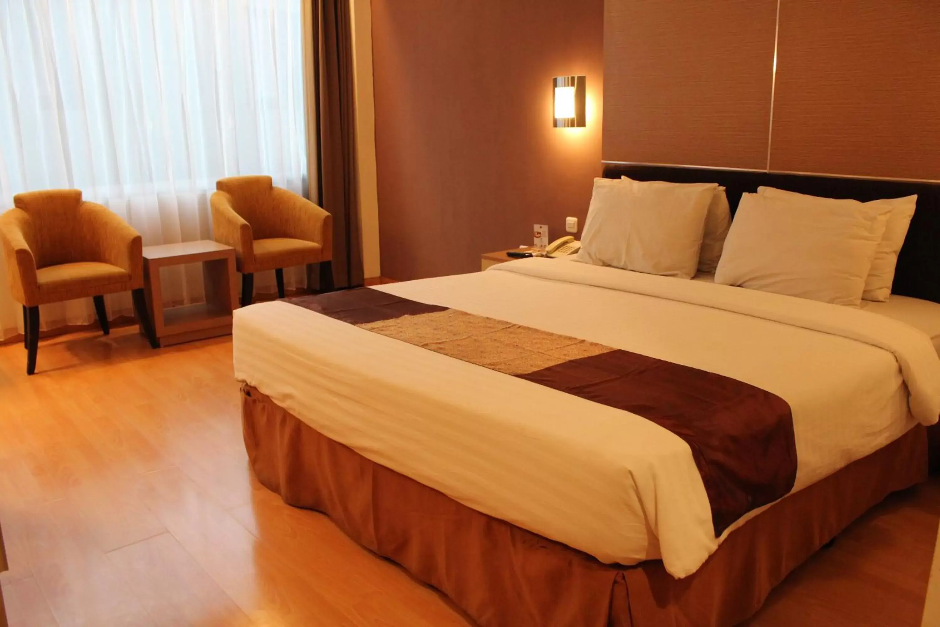 Bed in Grand Inna Tunjungan