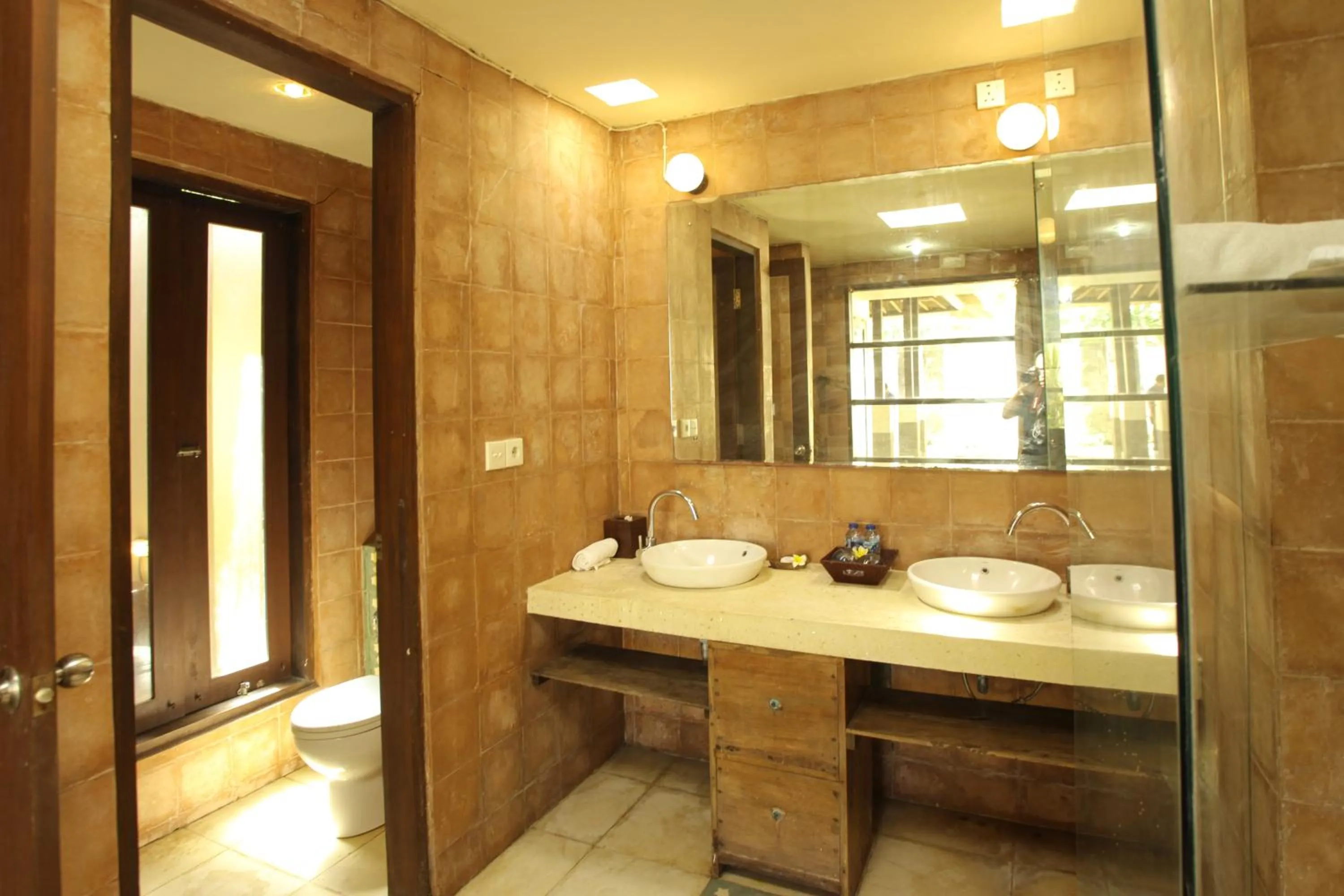 Bathroom in Visakha Sanur by Puri Signatures
