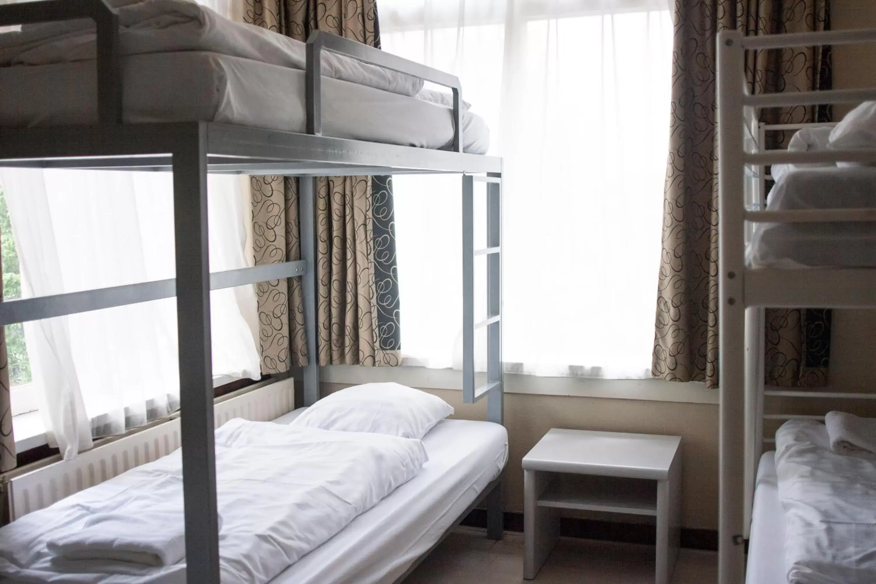 Bed, Bunk Bed in Budget Trianon Hotel