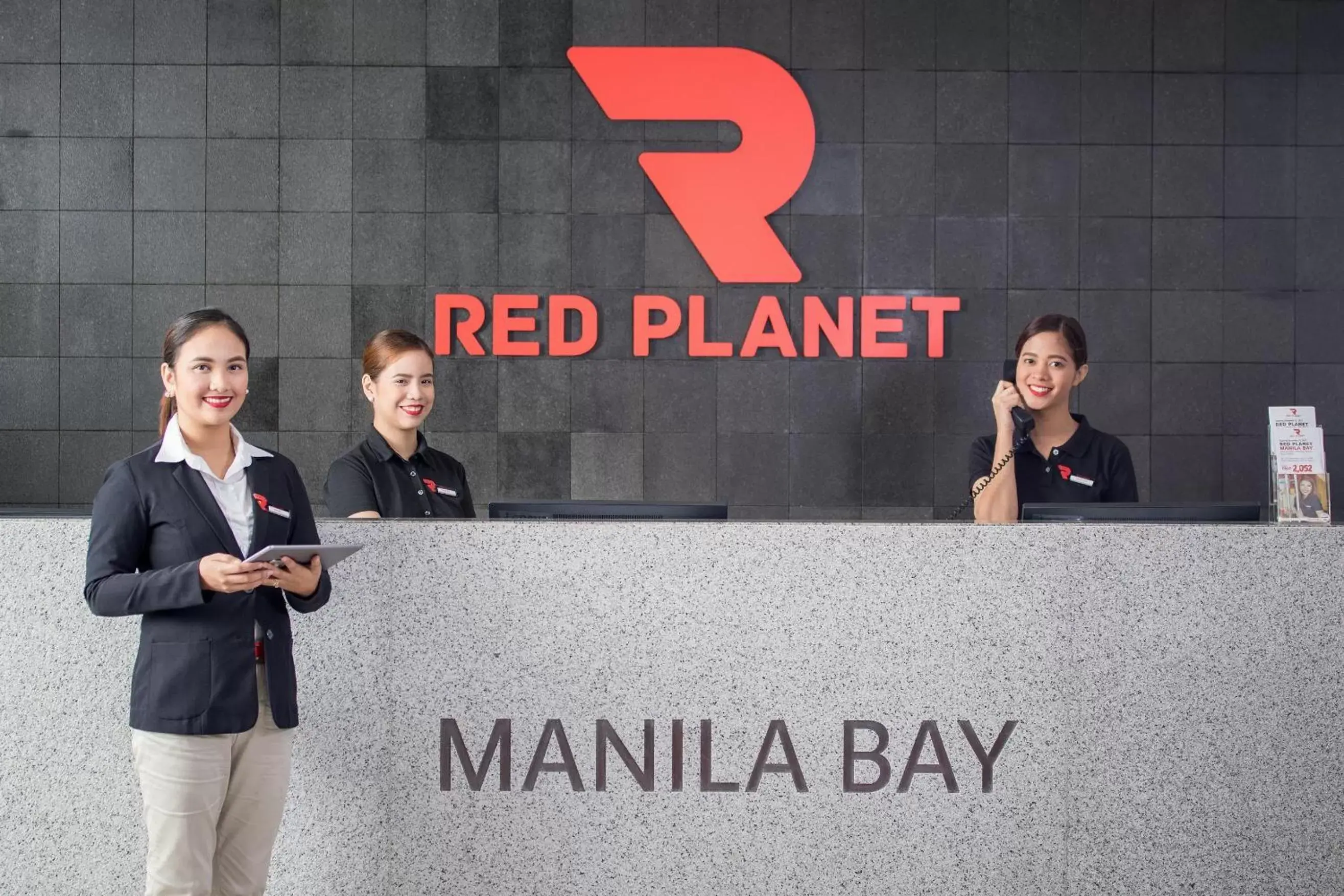 Staff in Red Planet Manila Bay