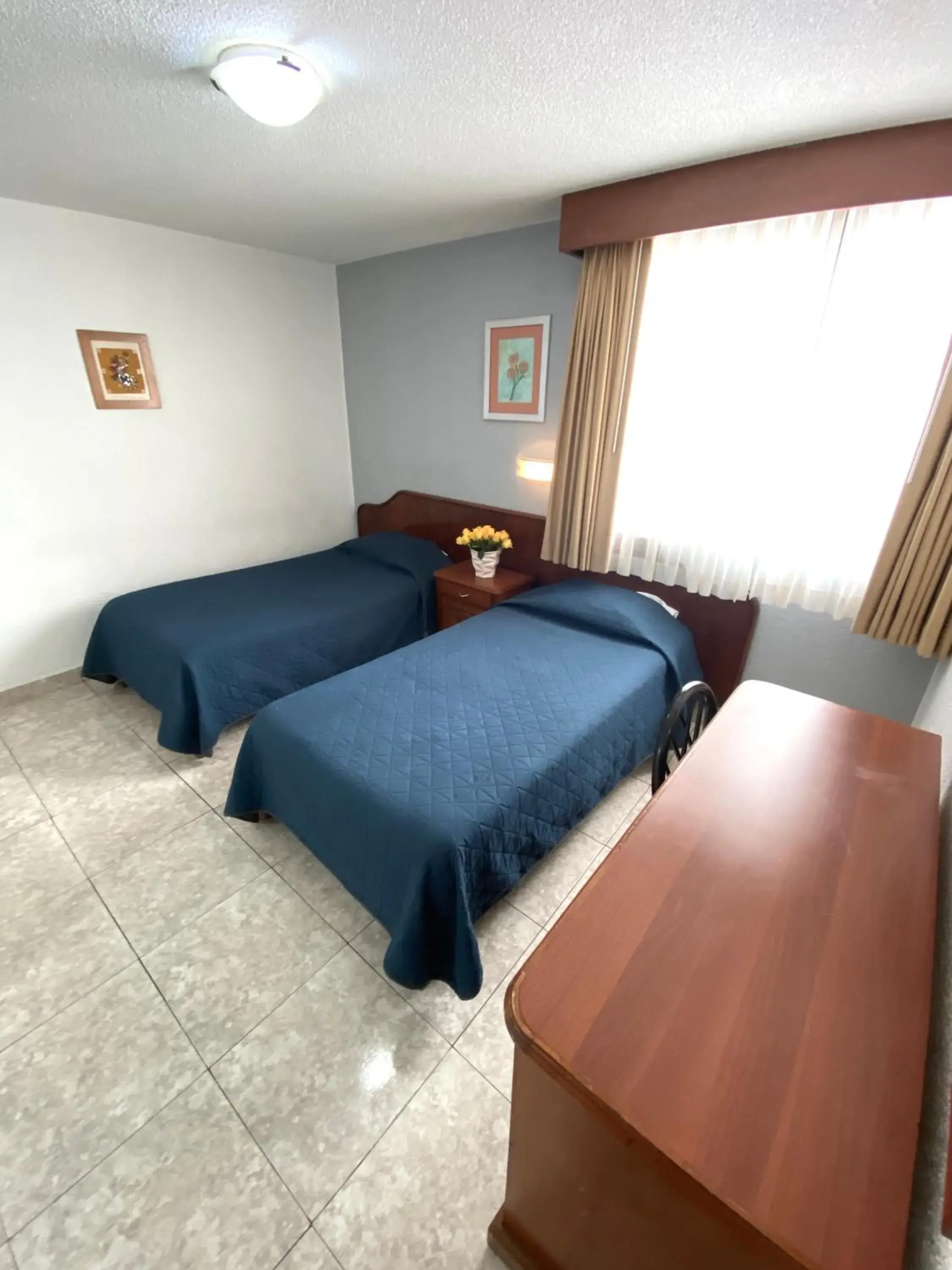 Bed in Hotel Qualitel Plus