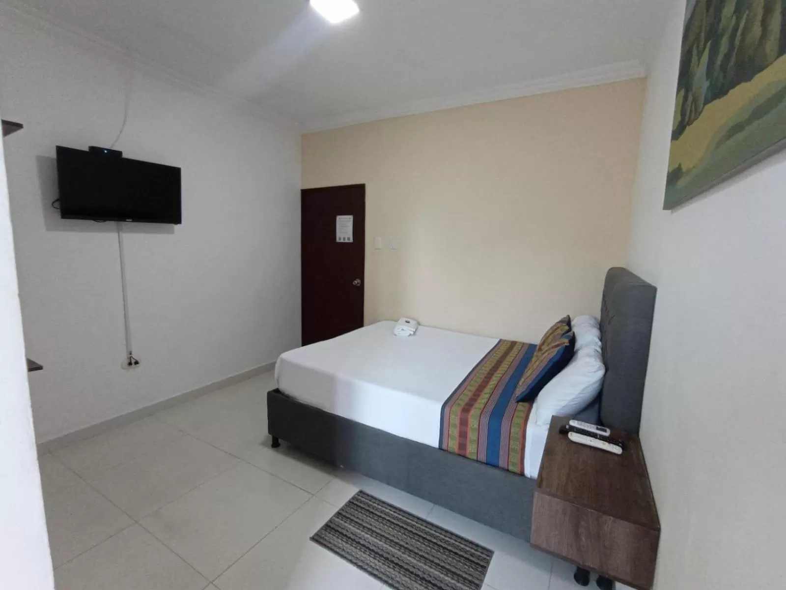 Bed in ANAJIRAWAA HOTEL