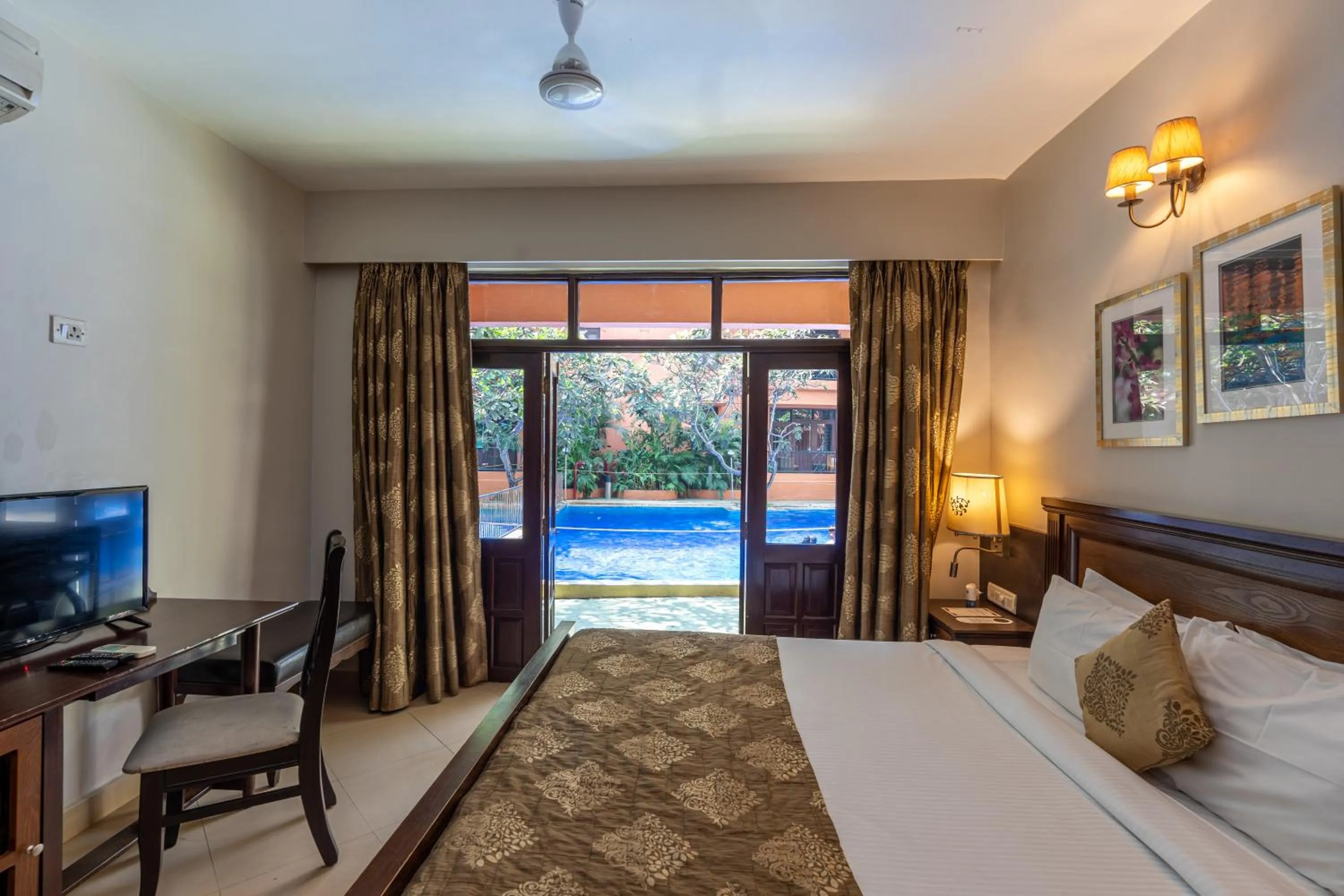 Bed in Neelam's The Grand Hotel Goa