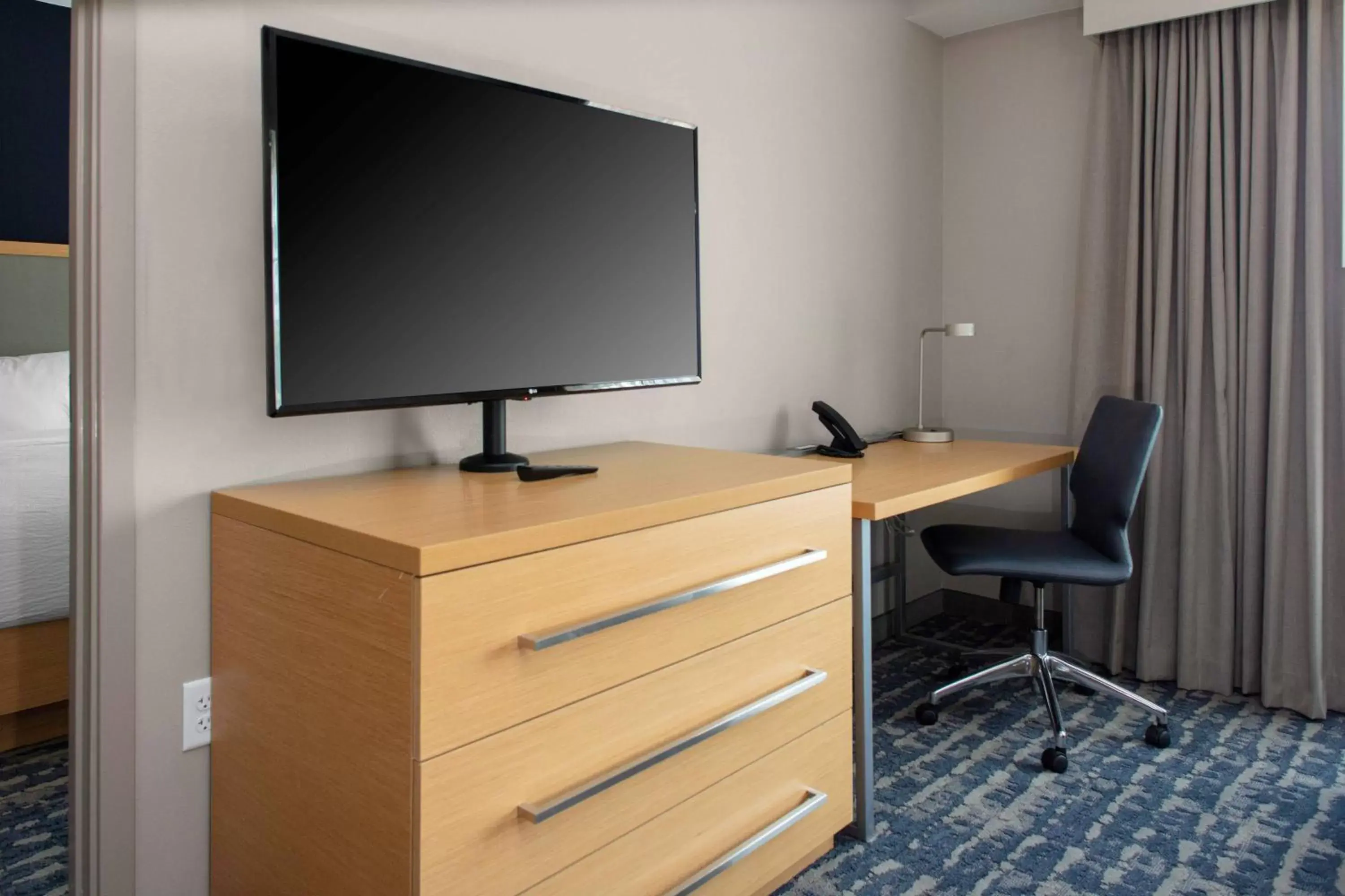 Bedroom, TV/Entertainment Center in Residence Inn by Marriott Jekyll Island