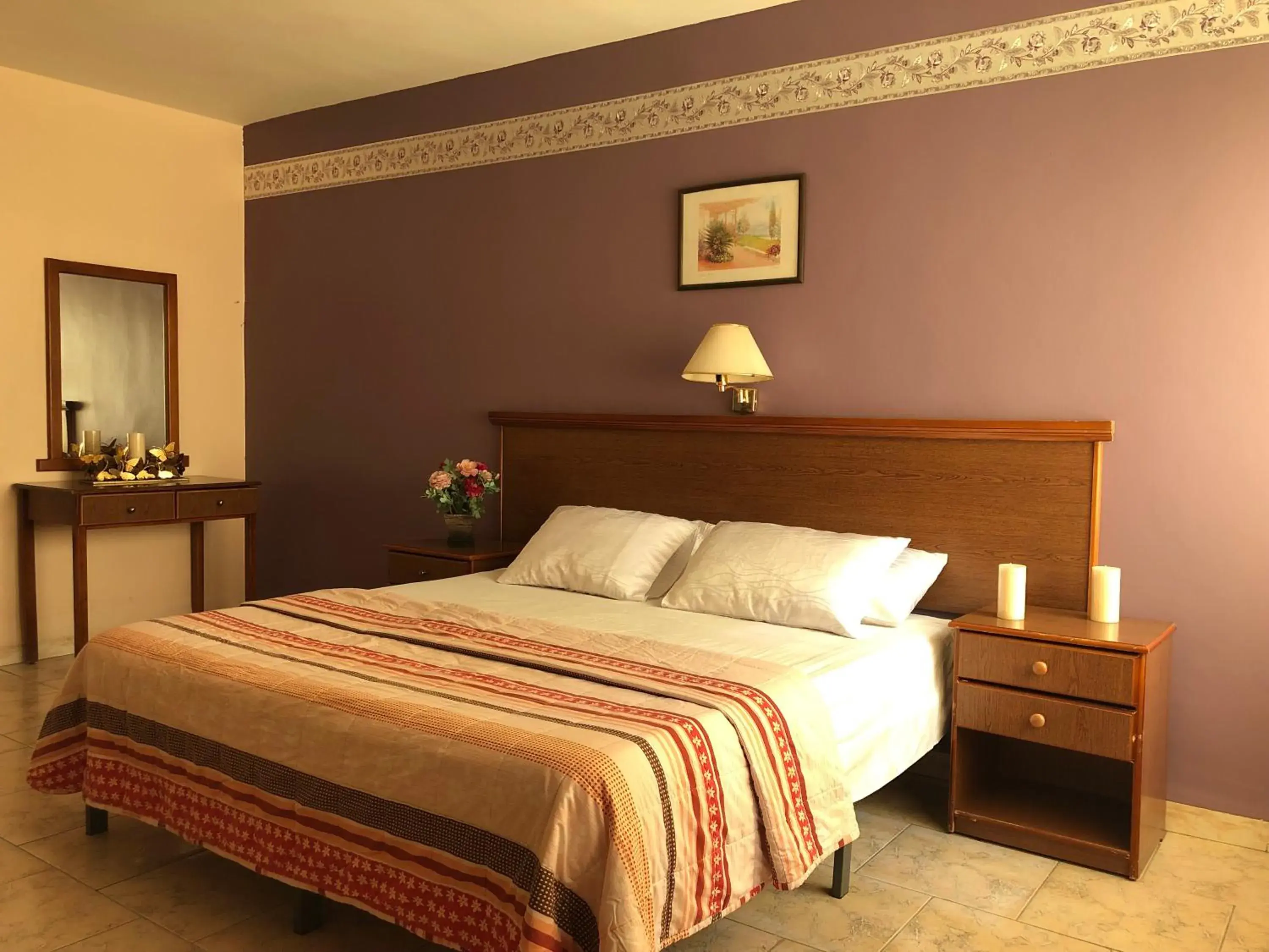 Bed in Sufara Hotel Suites
