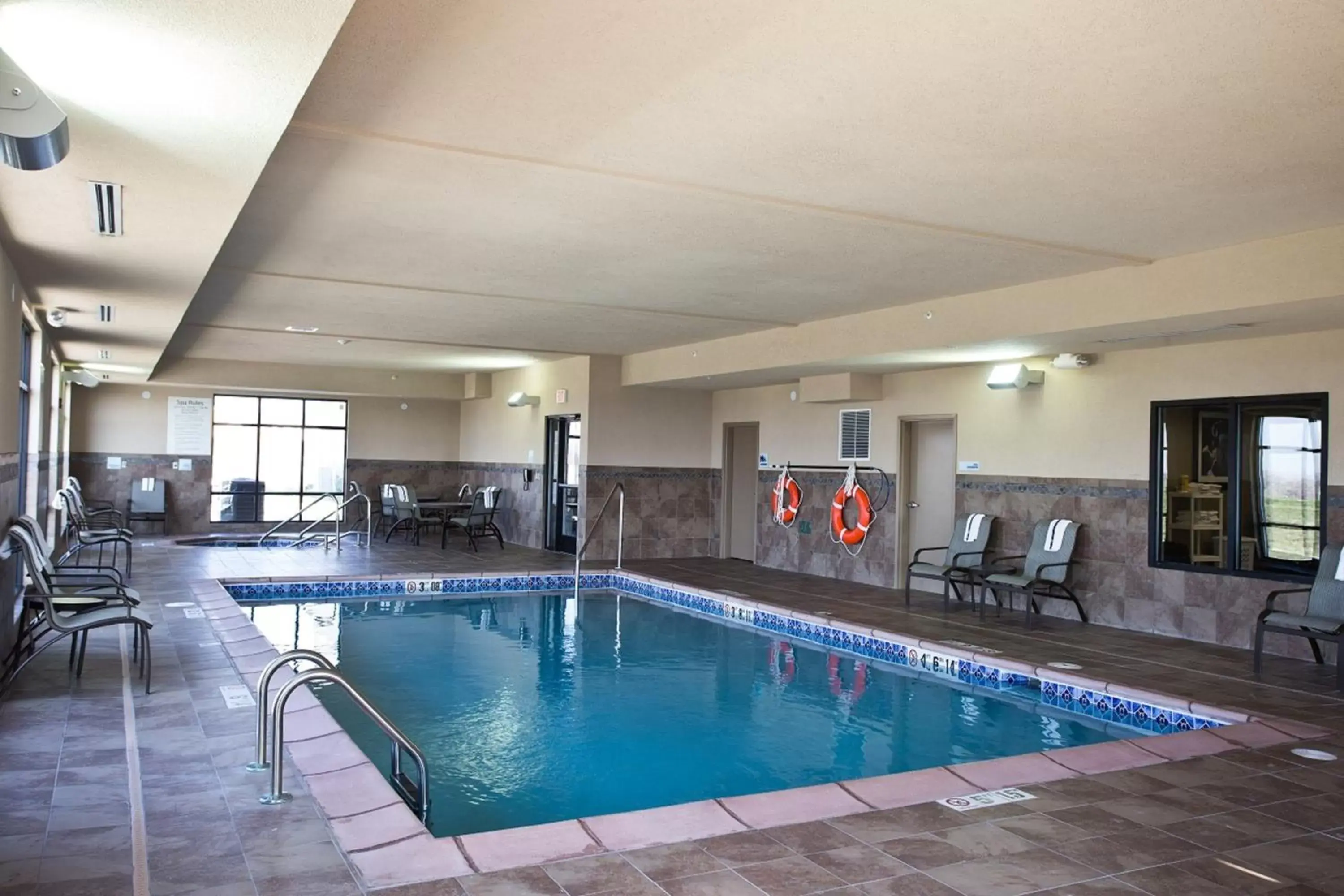 Swimming Pool in Holiday Inn Express and Suites Urbandale Des Moines, an IHG Hotel