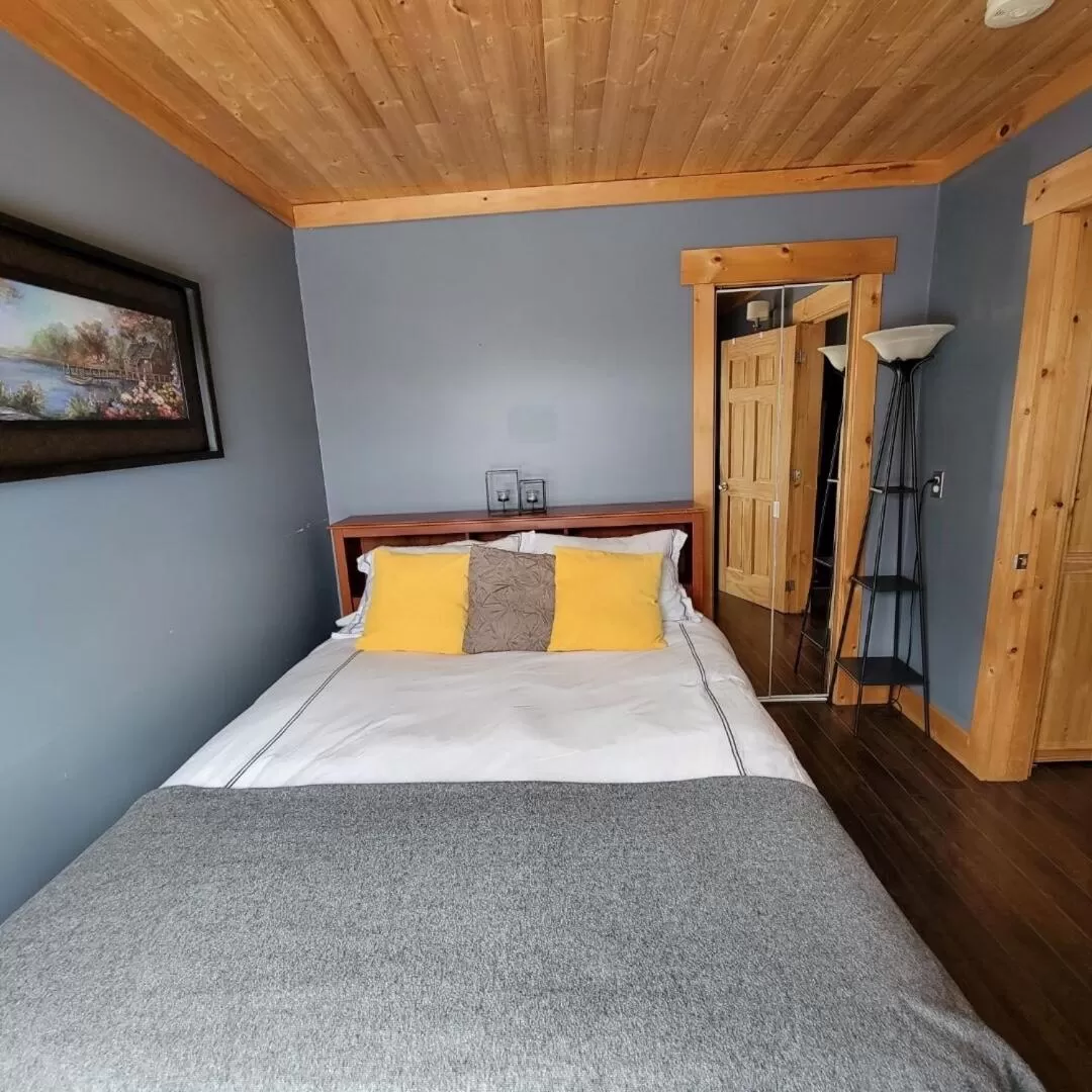 Bed in The Deer Lake Loft