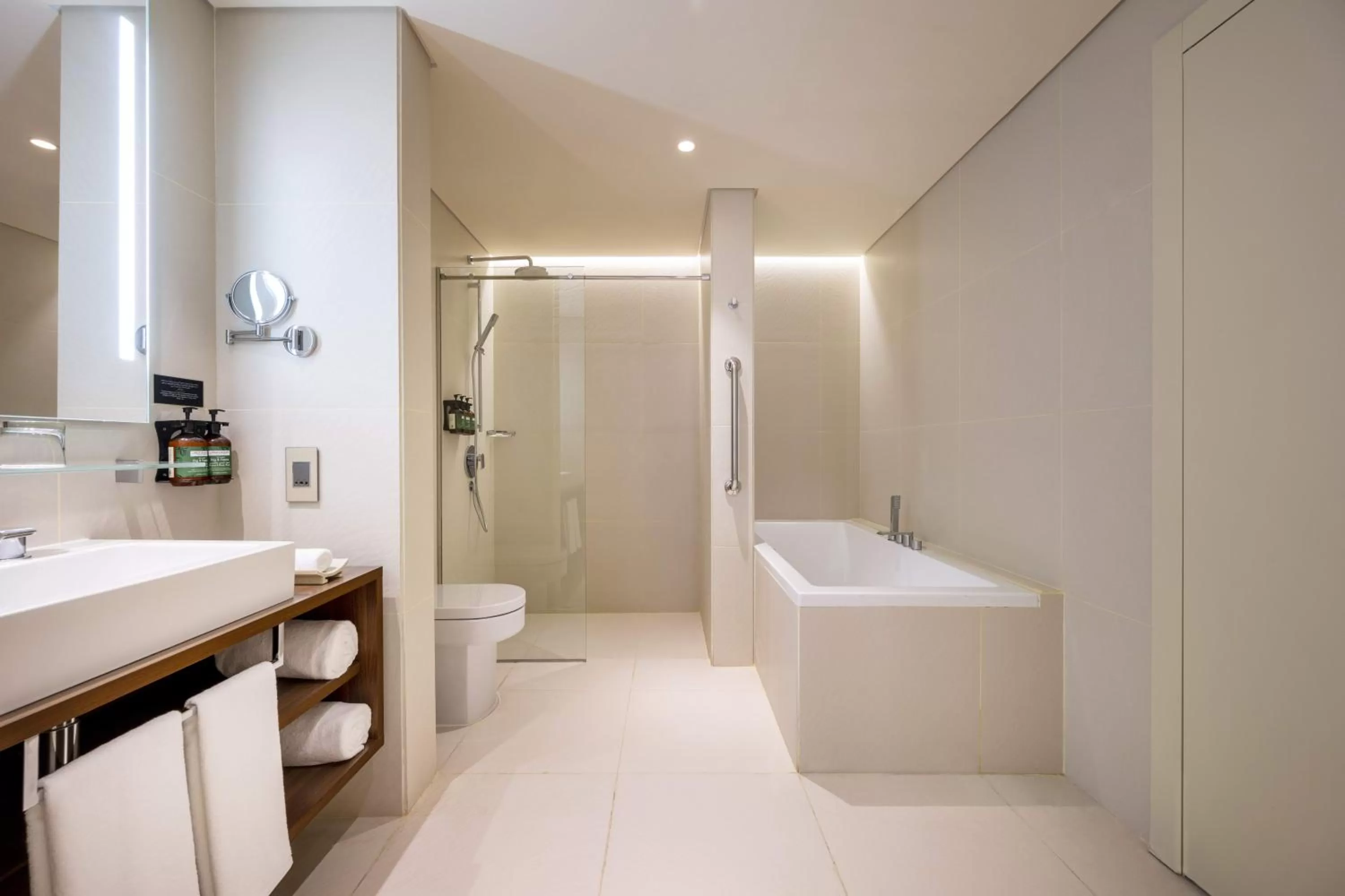 Bathroom in voco Doha West Bay Suites by IHG