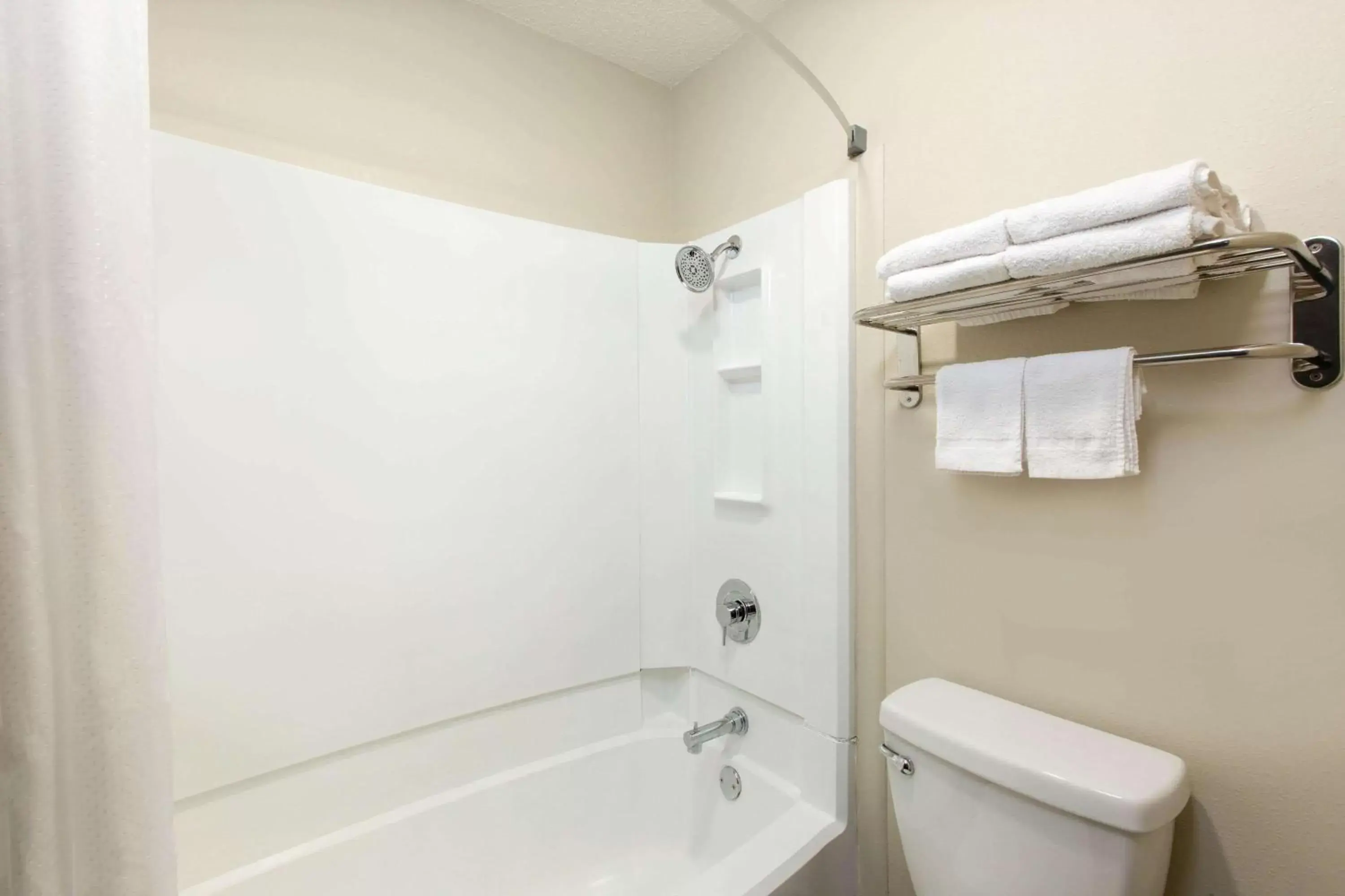 Bathroom in Days Inn & Suites by Wyndham Wisconsin Dells