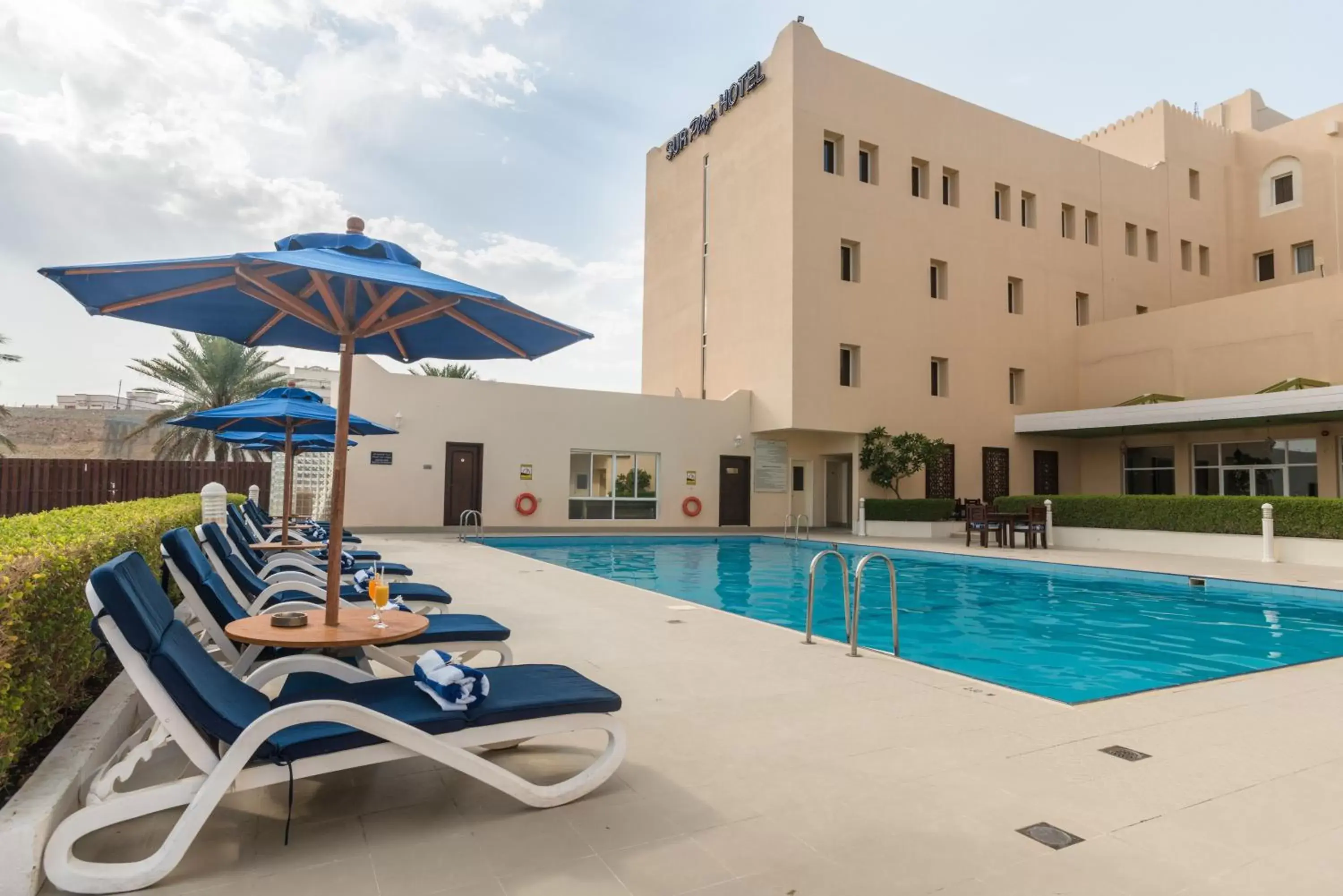 Swimming pool, Property Building in Sur Plaza Hotel