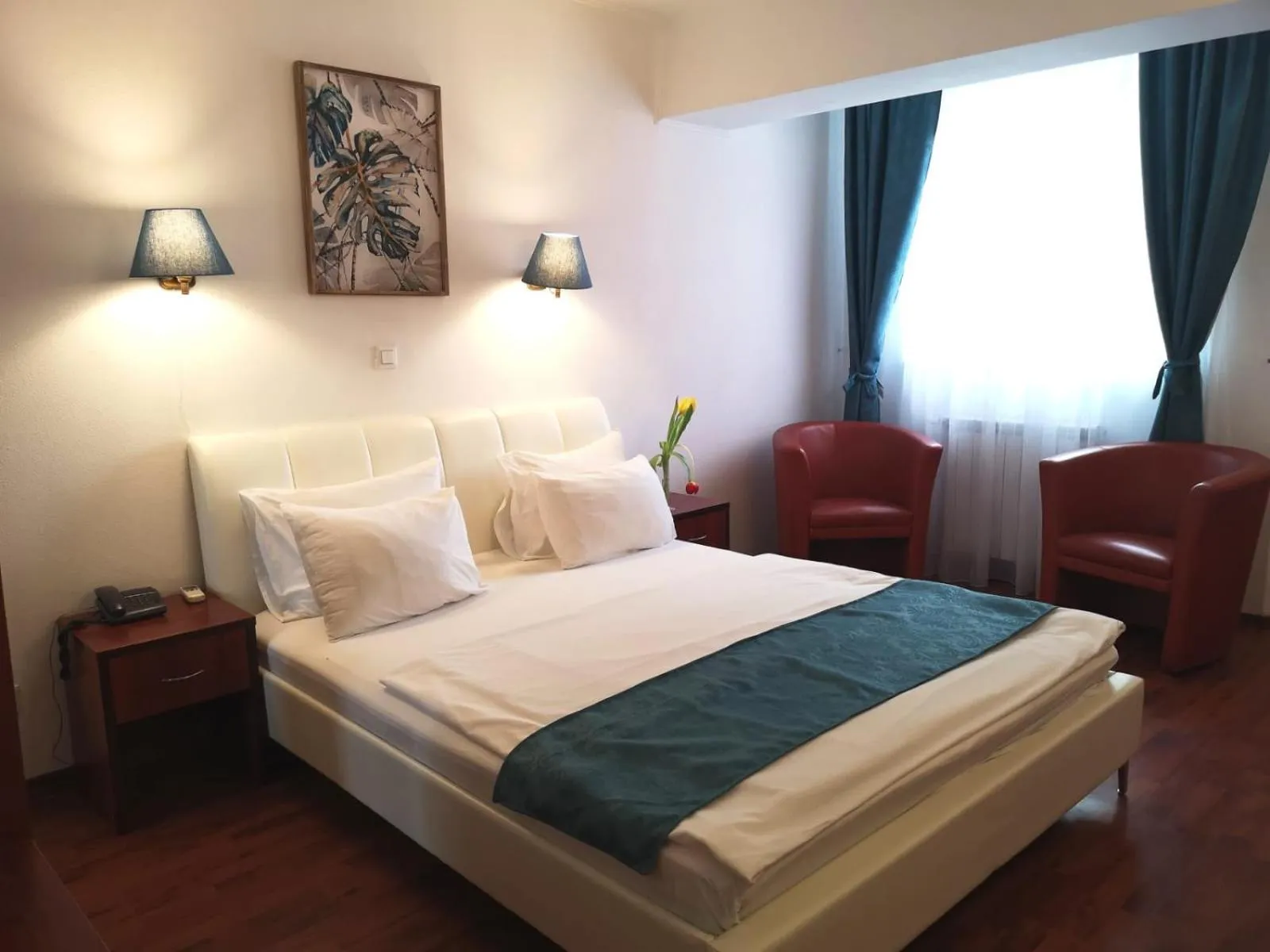 Bed in Atrium Hotel Bucharest City Center