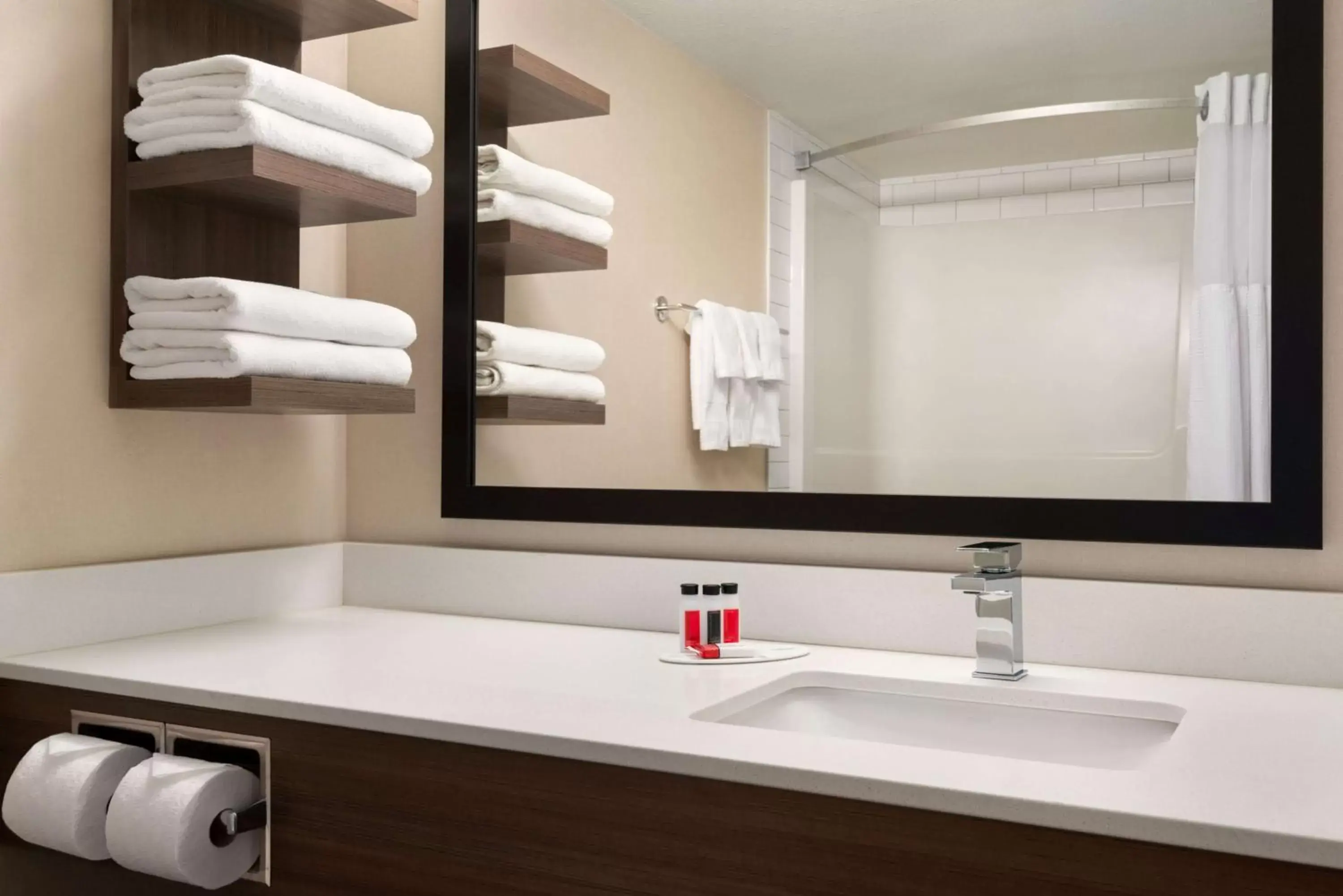 Bathroom in Ramada by Wyndham Airdrie Hotel & Suites