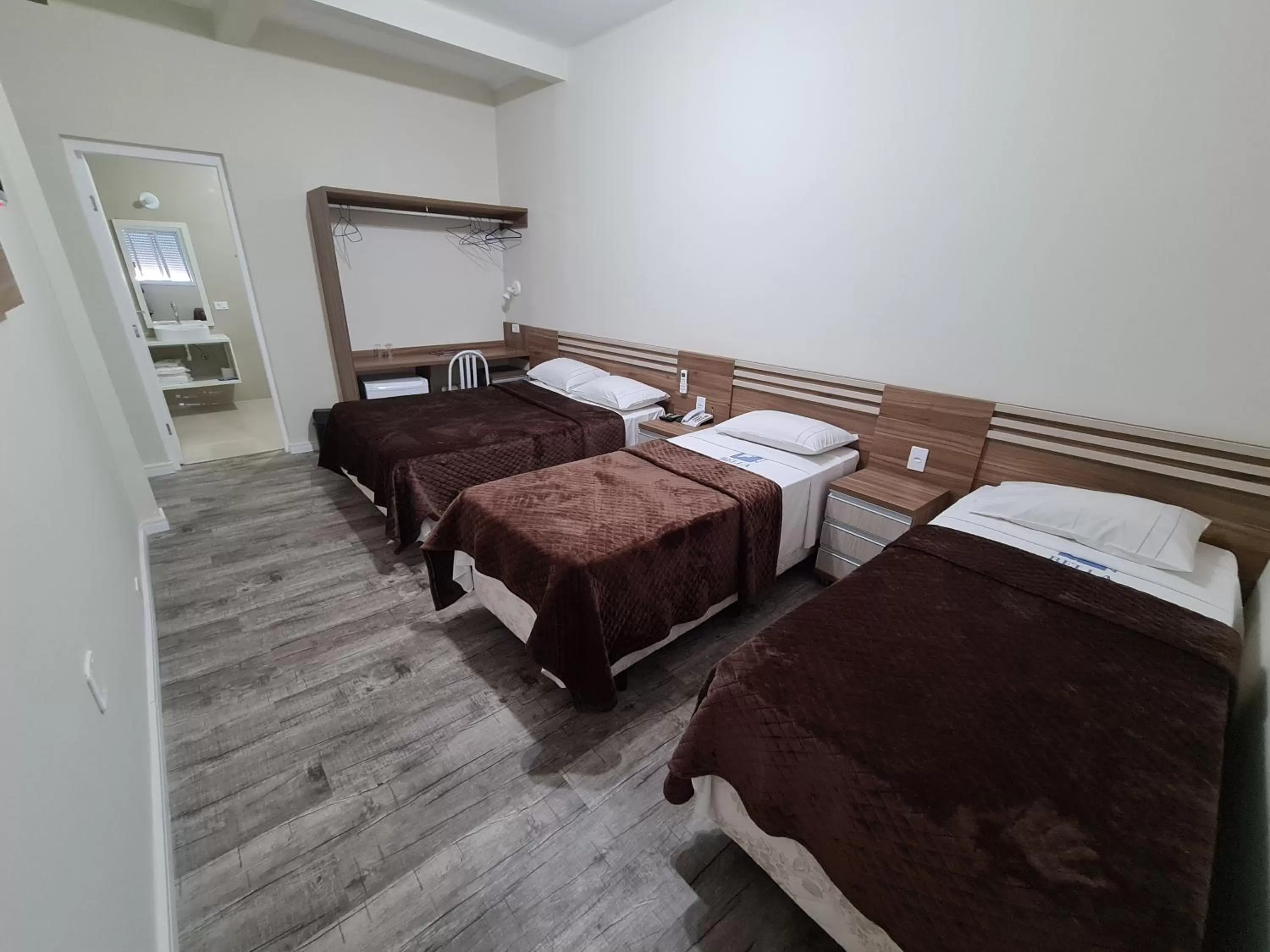 Bed in Bella Augusta Hotel