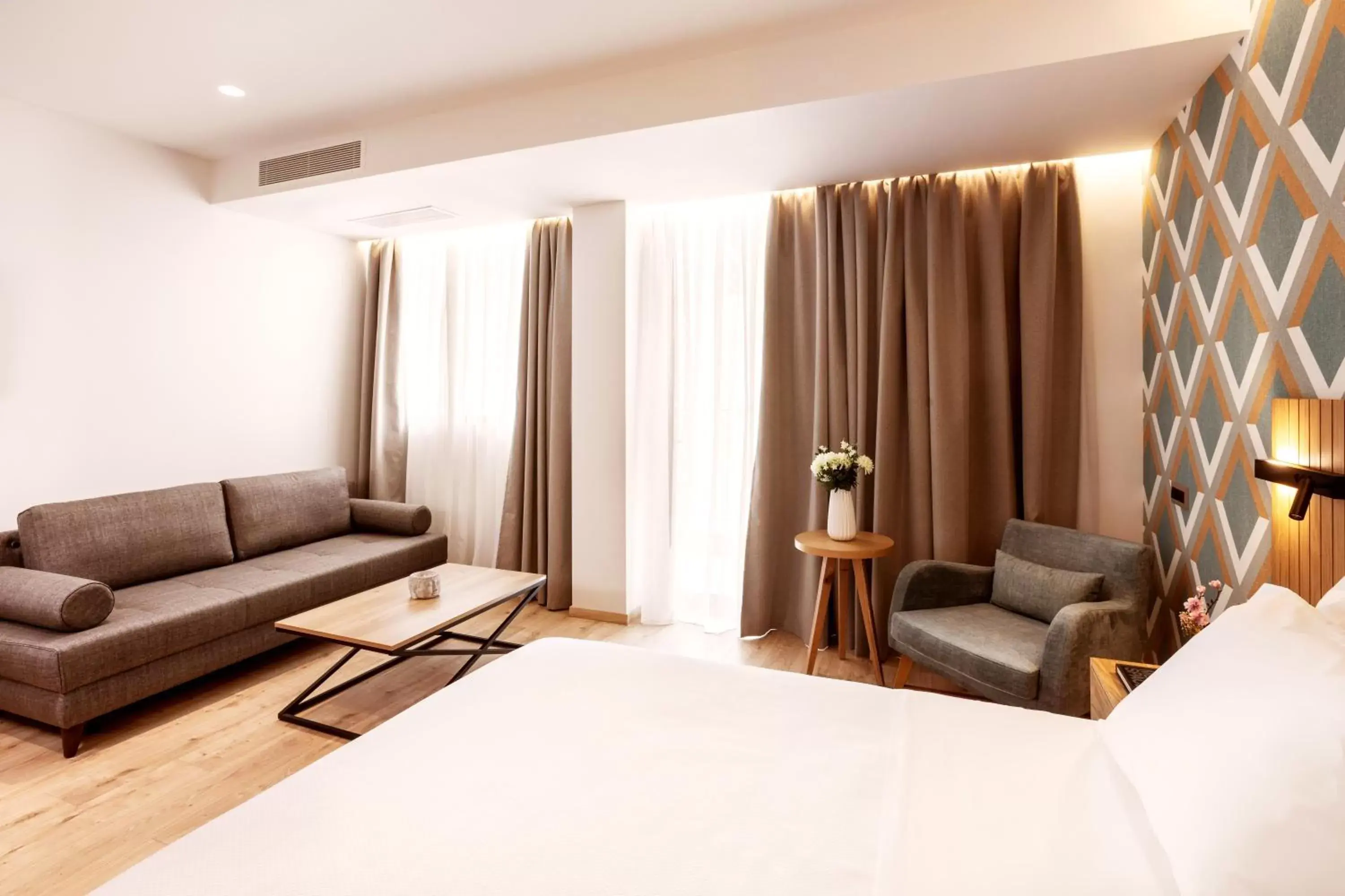 Bed, Seating Area in DAYS City Suites Athens