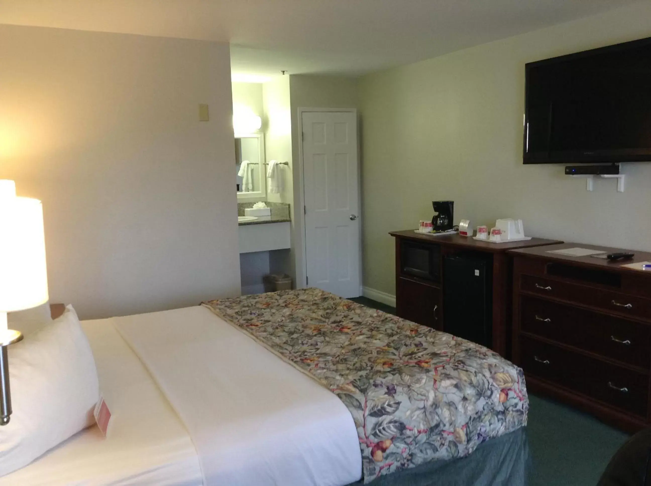 Bed in Ramada by Wyndham Oceanside