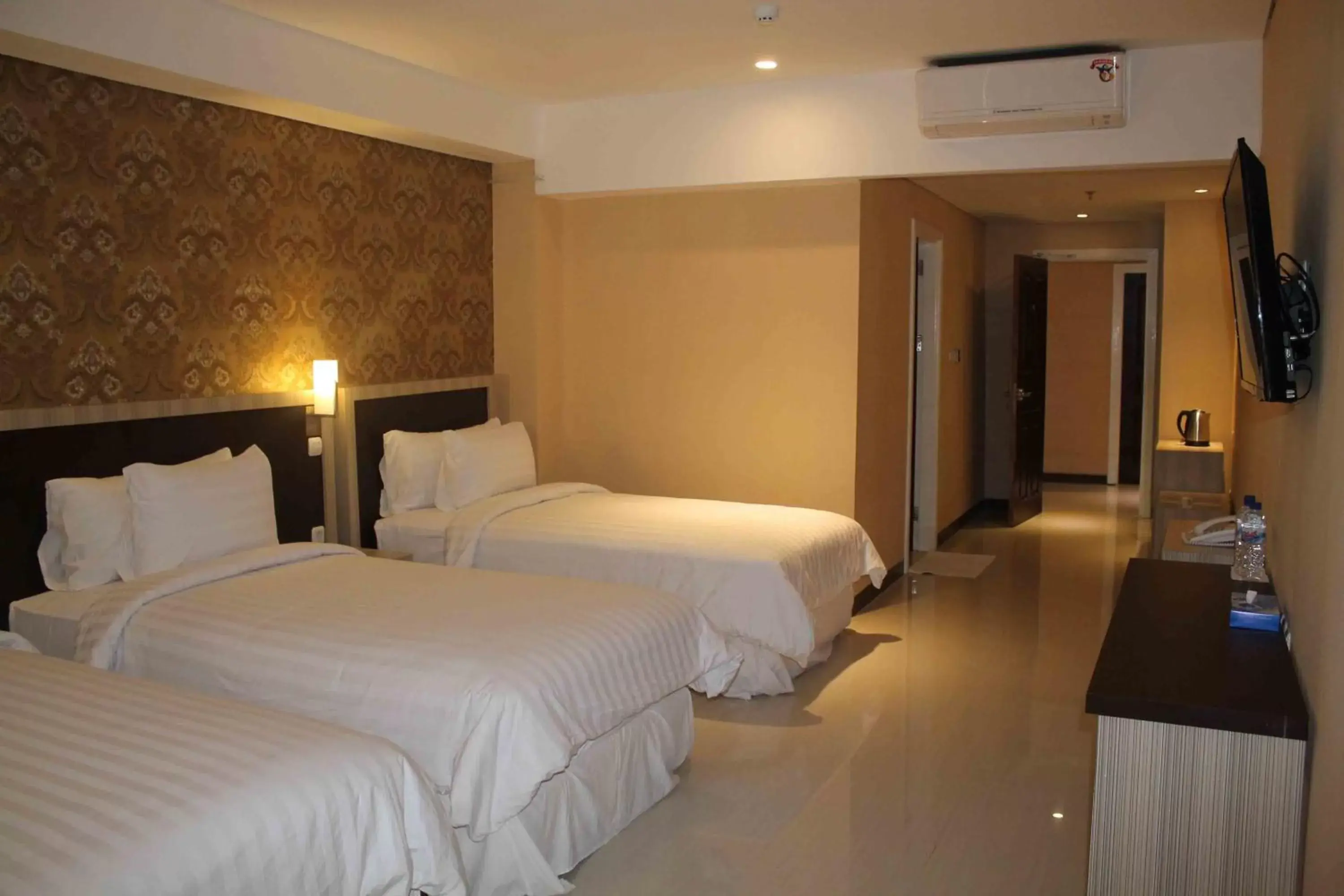 Photo of the whole room, Bed in Sylvia Hotel Kupang