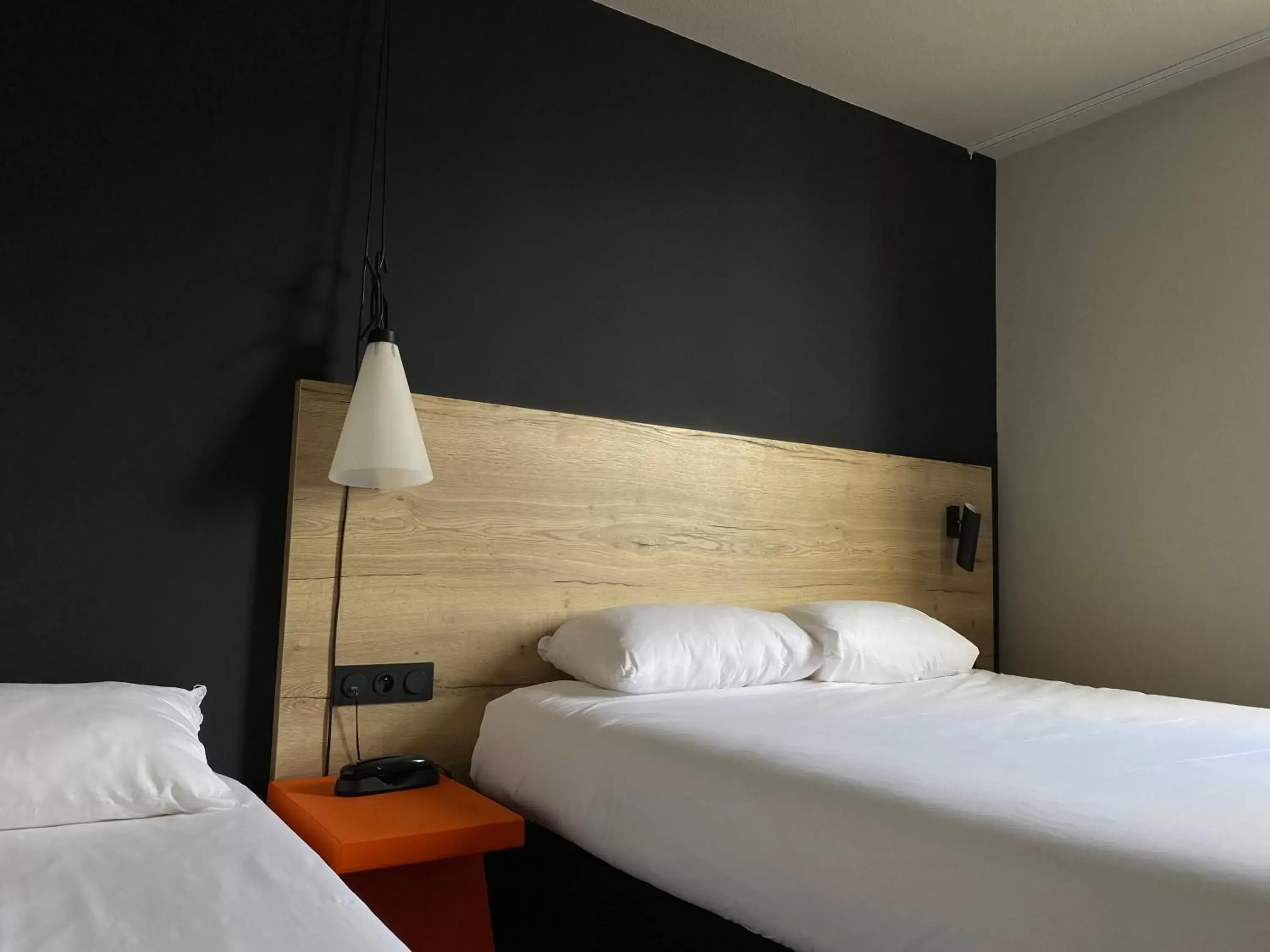 Bed in Ibis Styles Crolles Grenoble A41