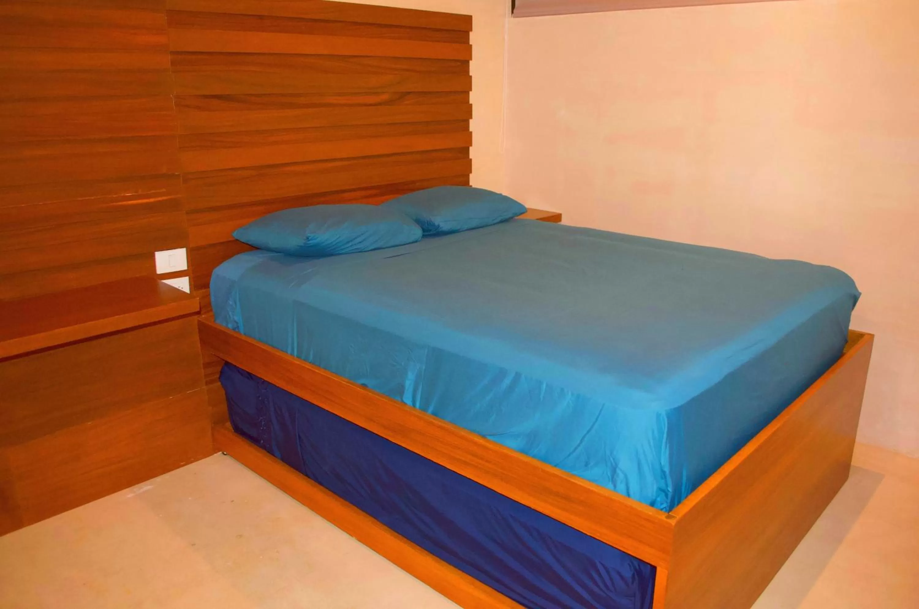 Bed in Gardens Coba - Luxury Cardinal