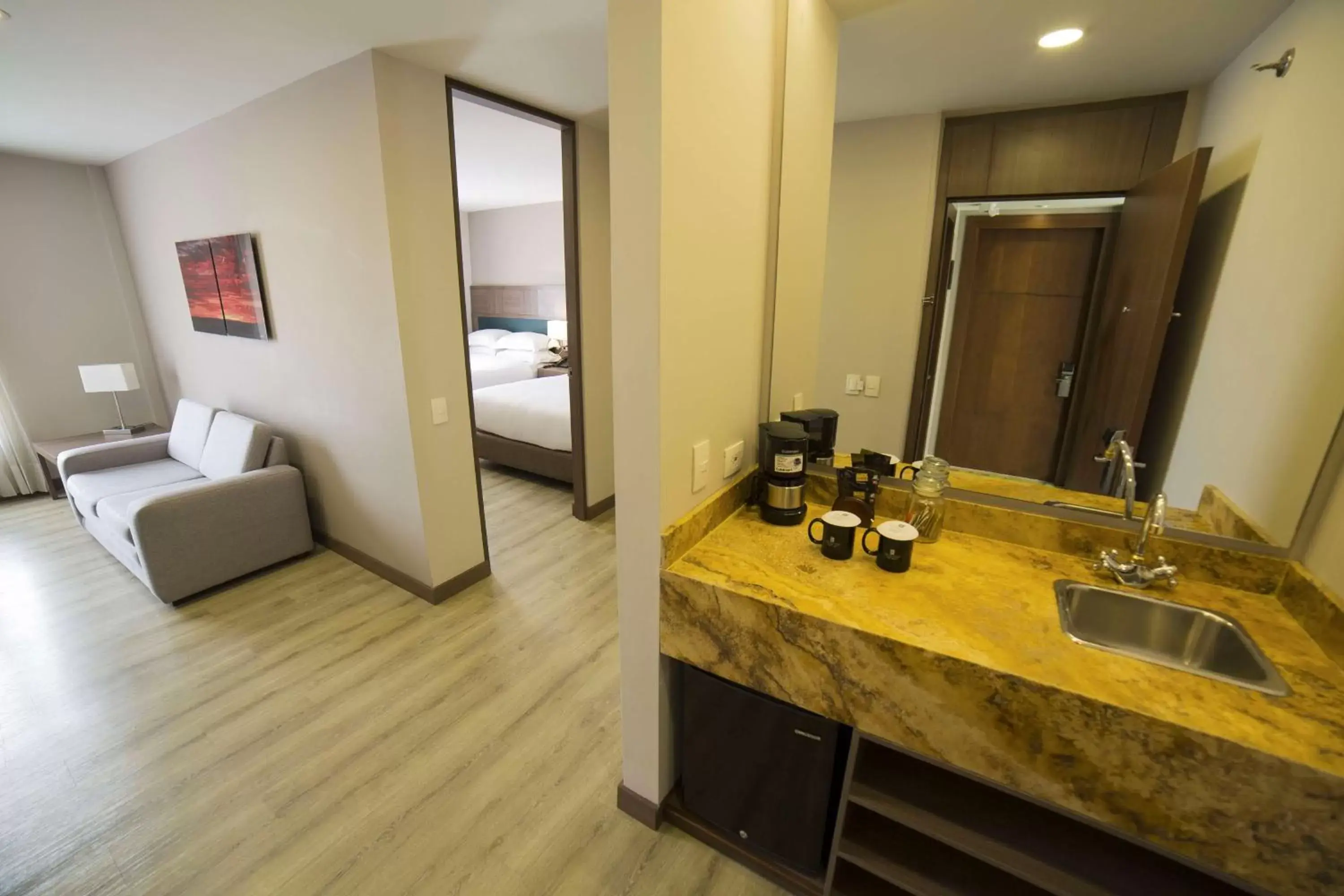 Living room, Bathroom in Embassy Suites by Hilton Bogotá - Rosales