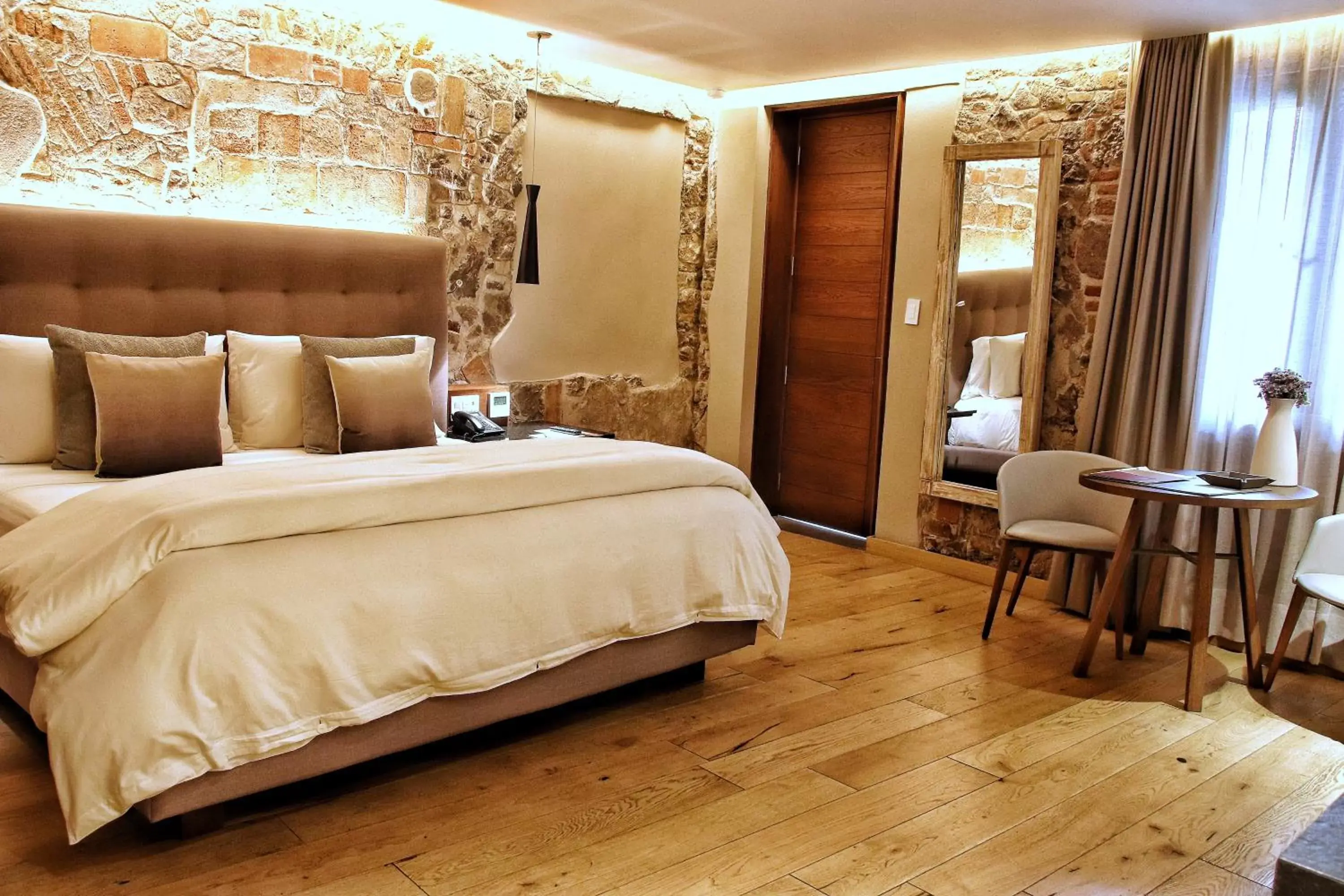 Bed in Cartesiano Boutique & Wellness Hotel