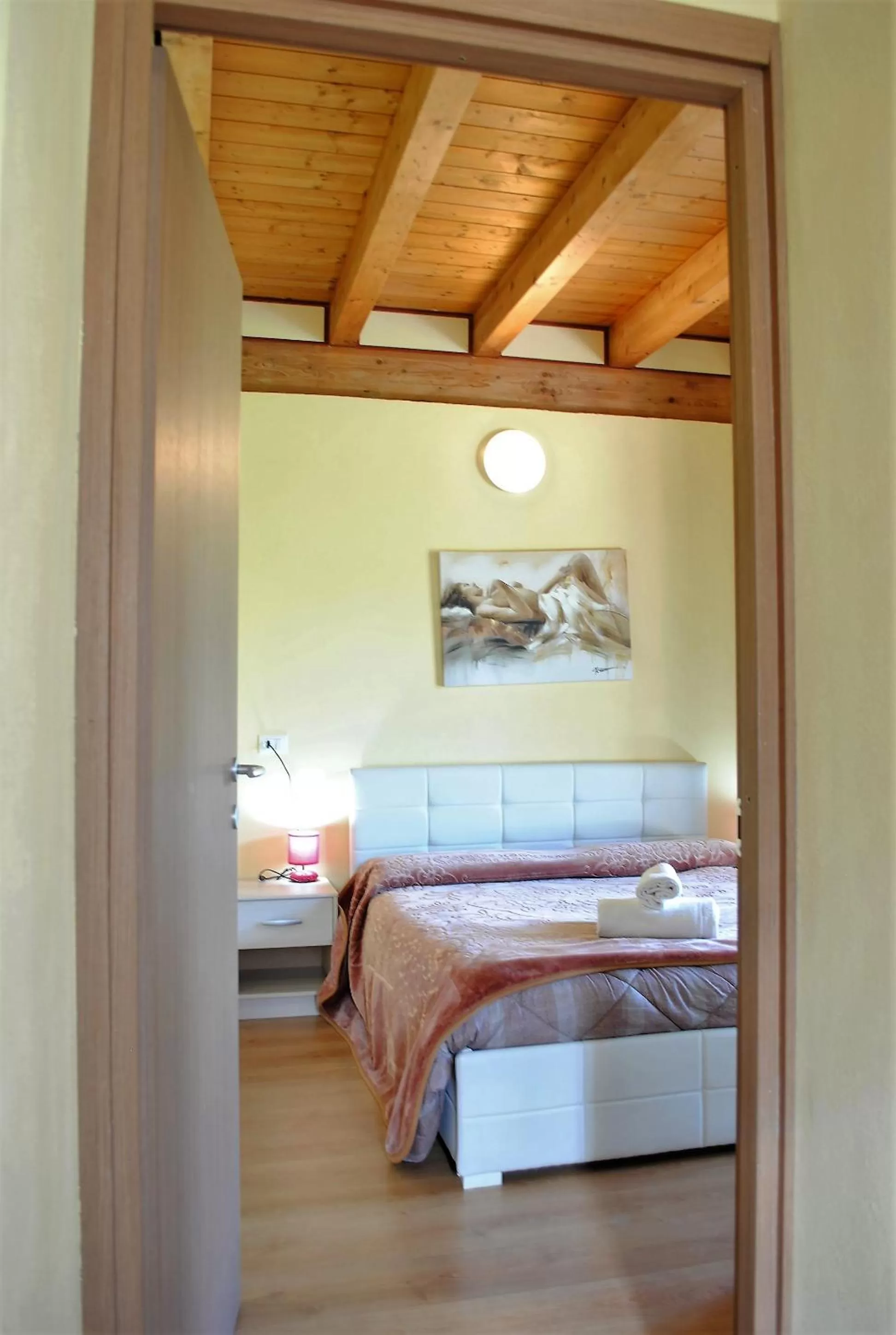 Photo of the whole room, Bed in AGRITURISMO MELOGRANO D'ORO
