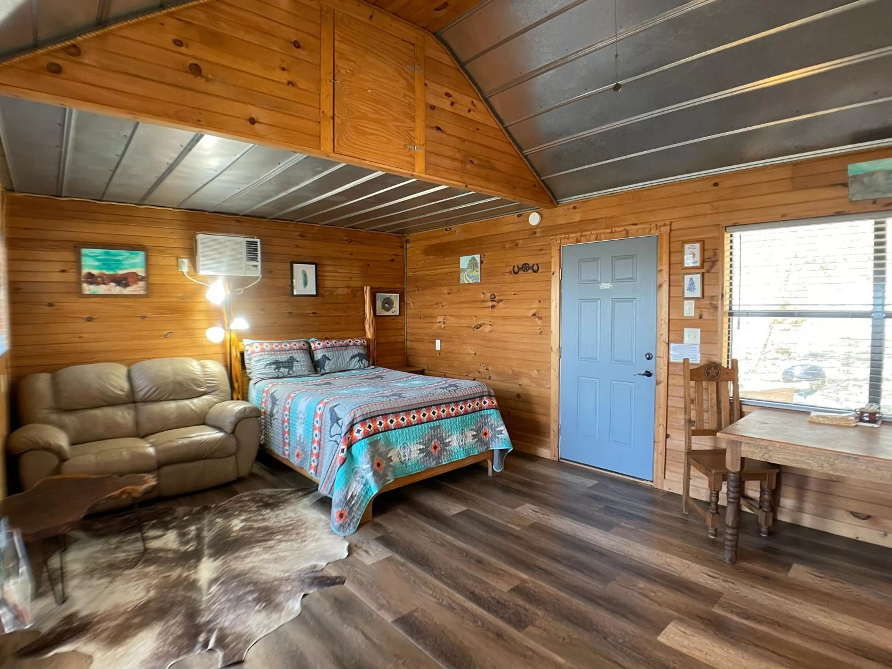 Bed in Walnut Canyon Cabins