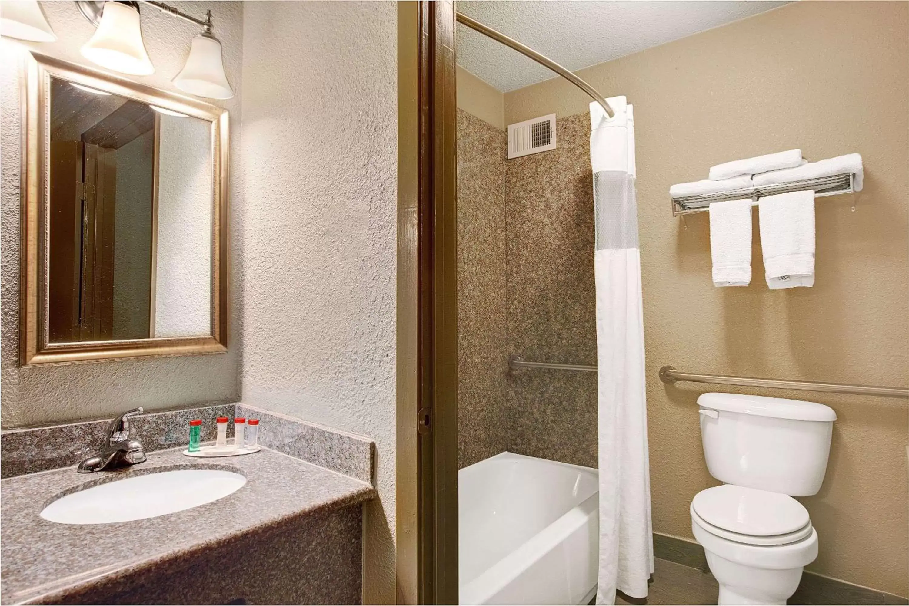 Bathroom in Ramada by Wyndham Houston Intercontinental Airport South