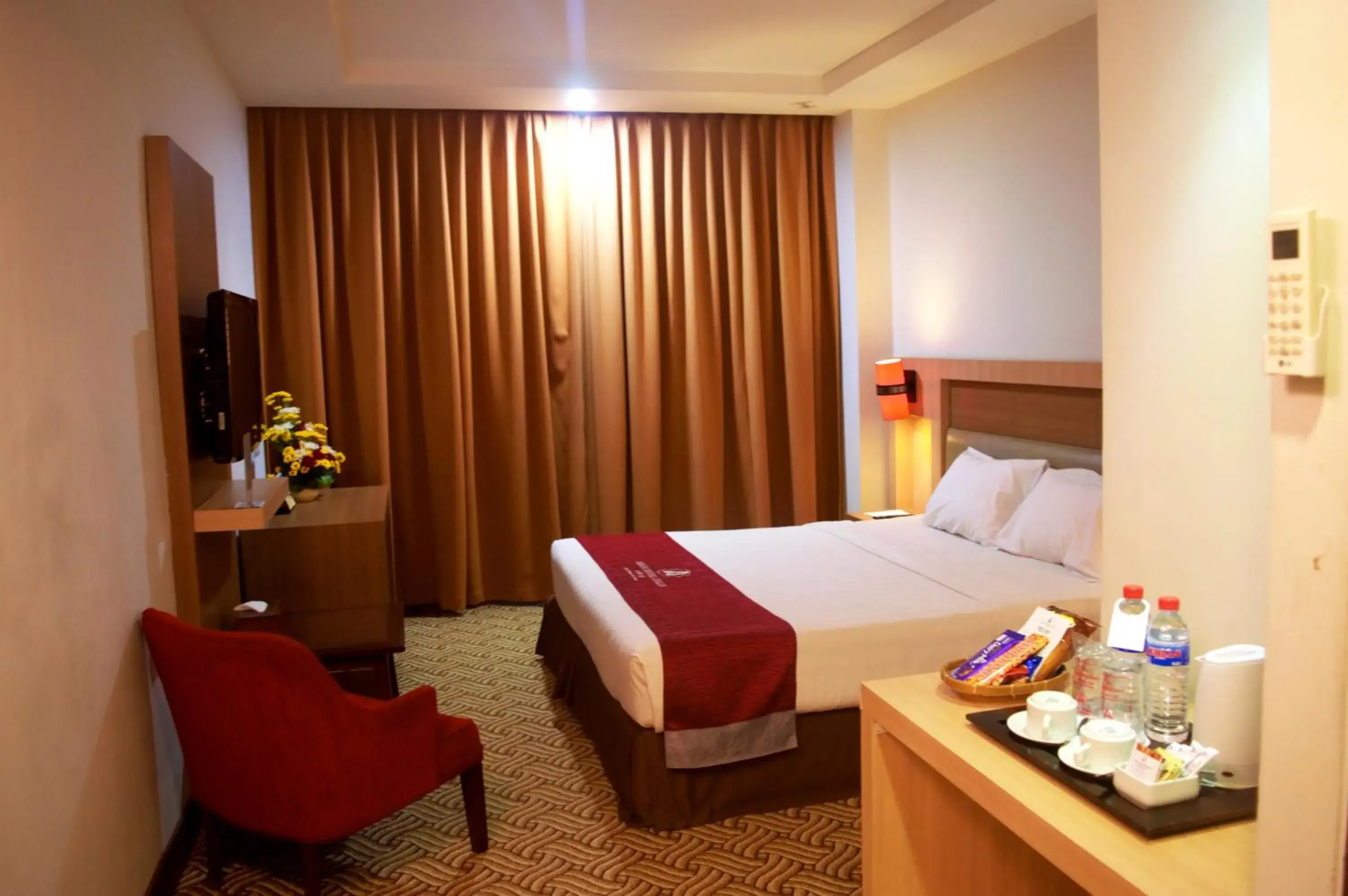 Bed in Abadi Hotel Malioboro Yogyakarta by Tritama Hospitality