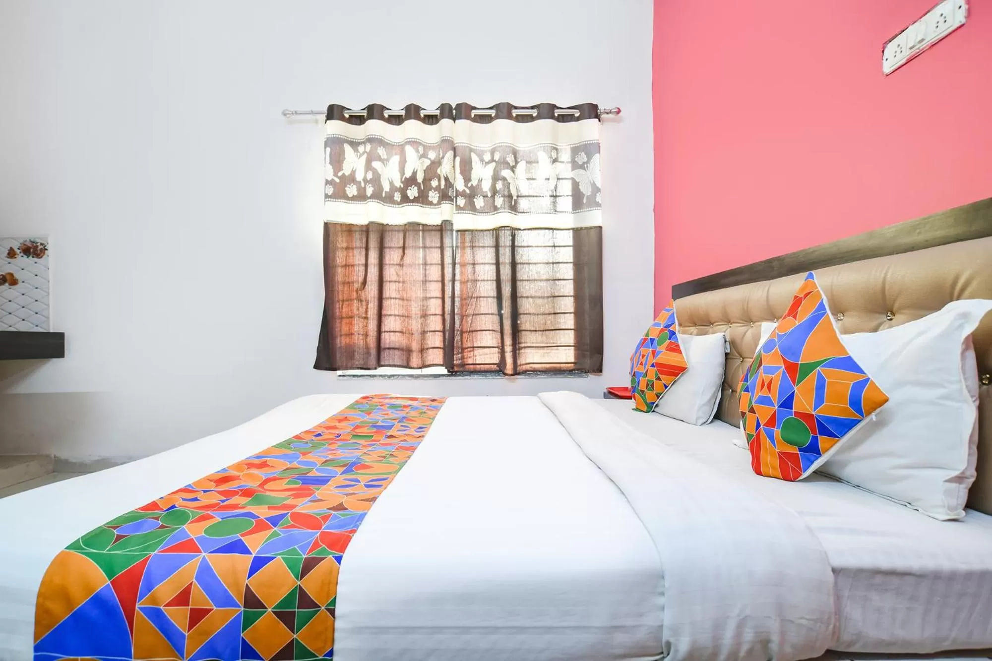 Bed in FabExpress Royal Palace Inn