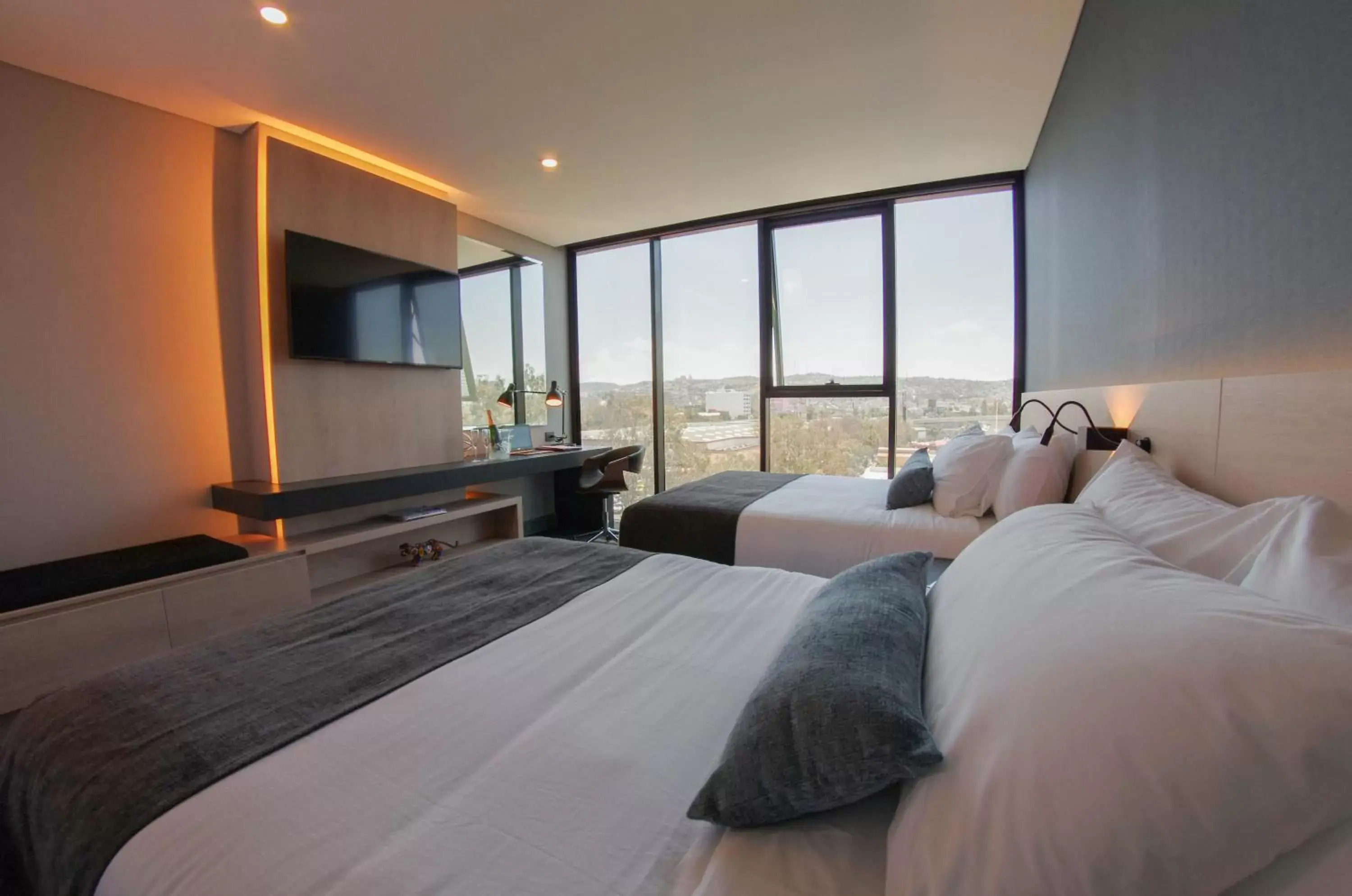 Bed in QUARTZ HOTEL & SPA