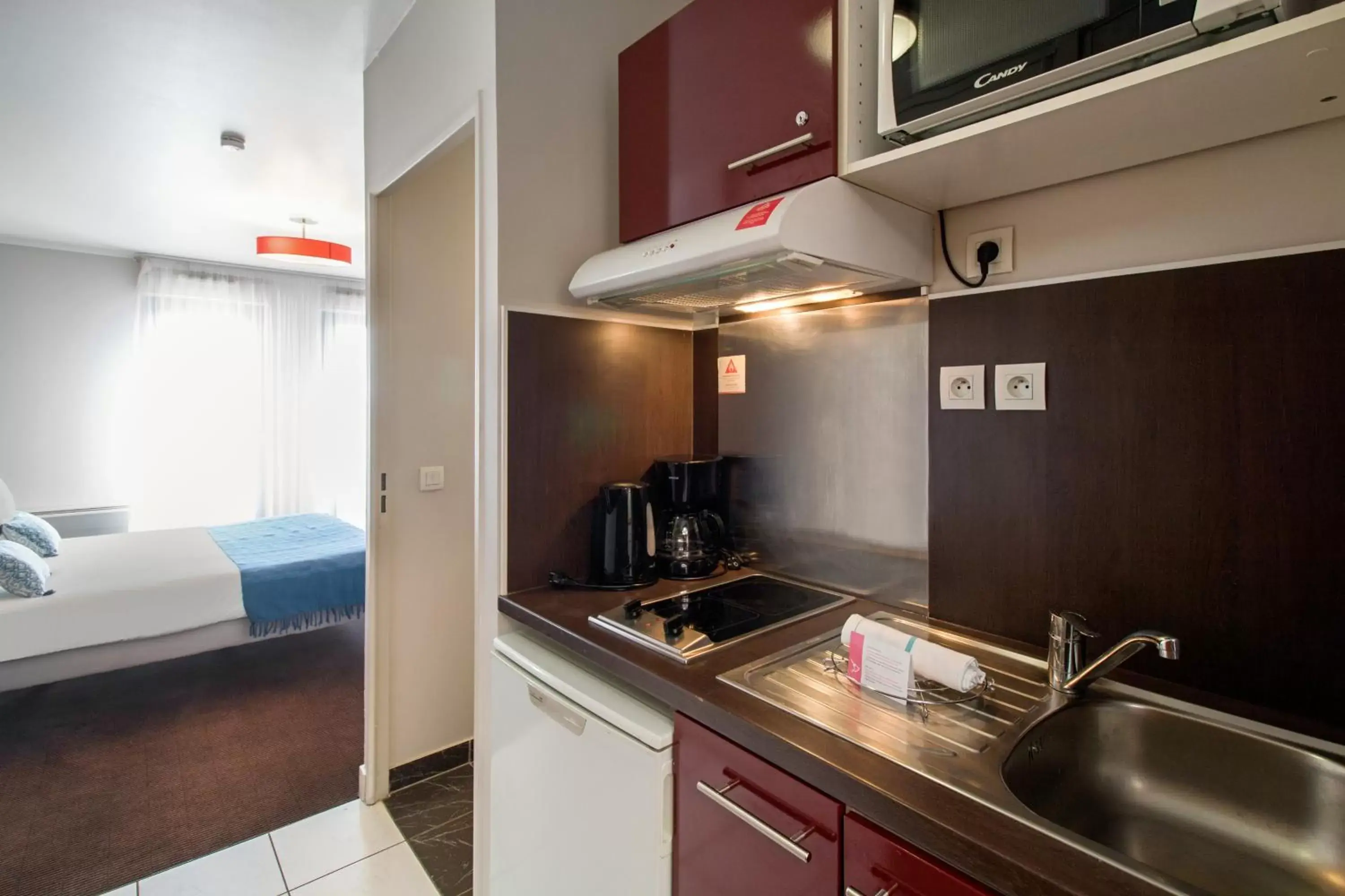 Kitchen or kitchenette, Kitchen/Kitchenette in Appart'City Confort Paris Villejuif (Ex Park&Suites)