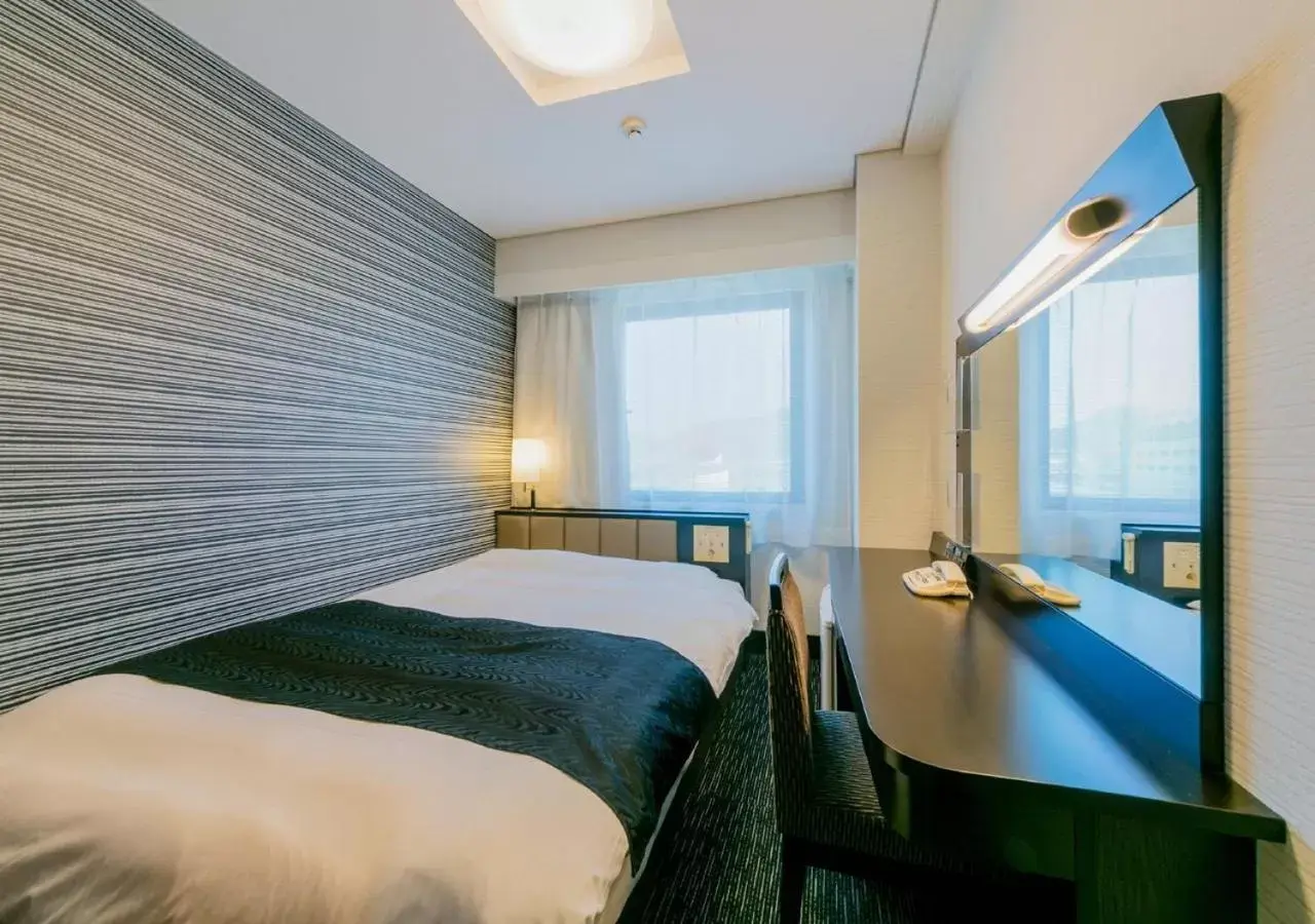 Photo of the whole room, Bed in APA Hotel Nagasaki-eki Minami