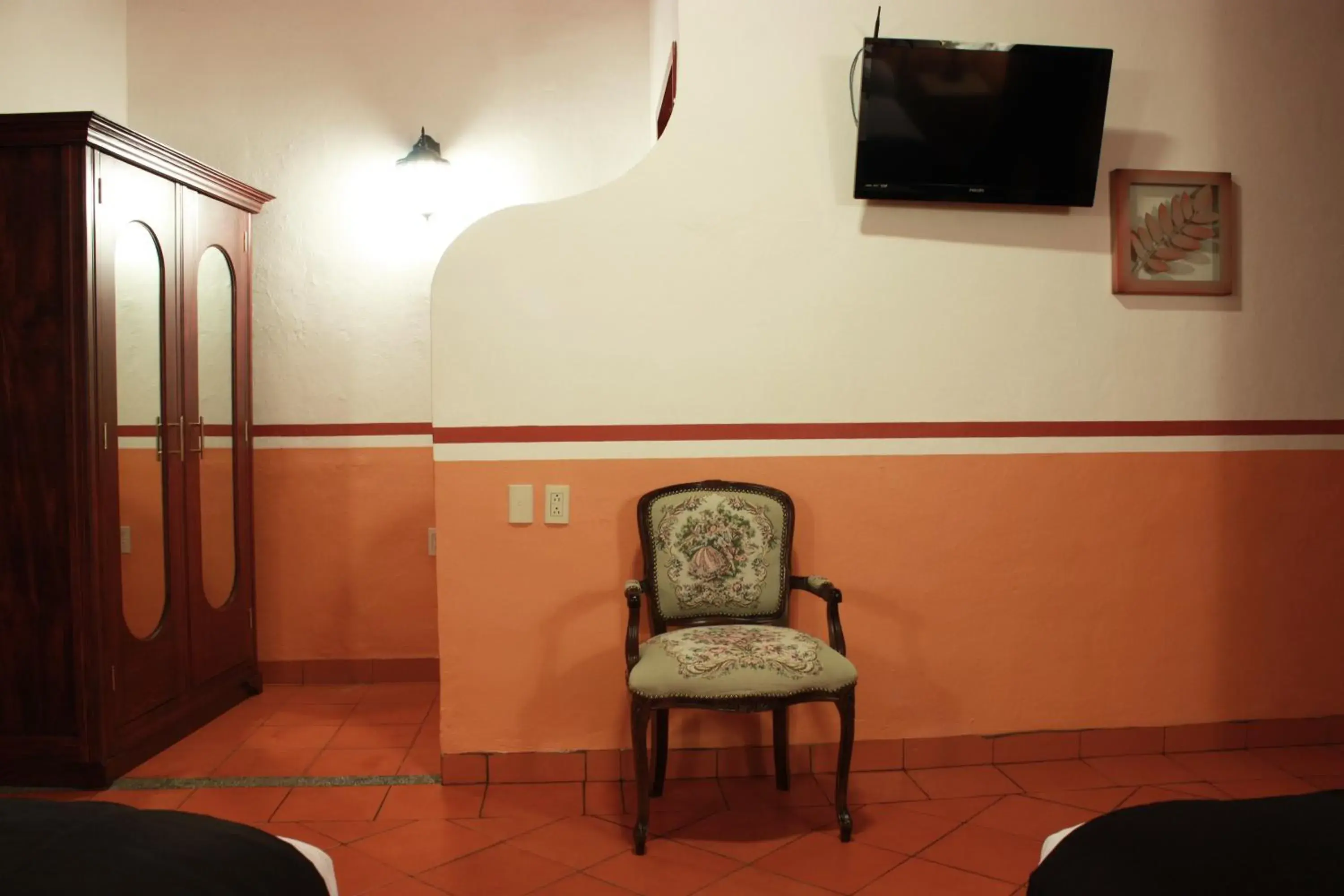 Photo of the whole room, TV/Entertainment Center in Hotel de la Paz
