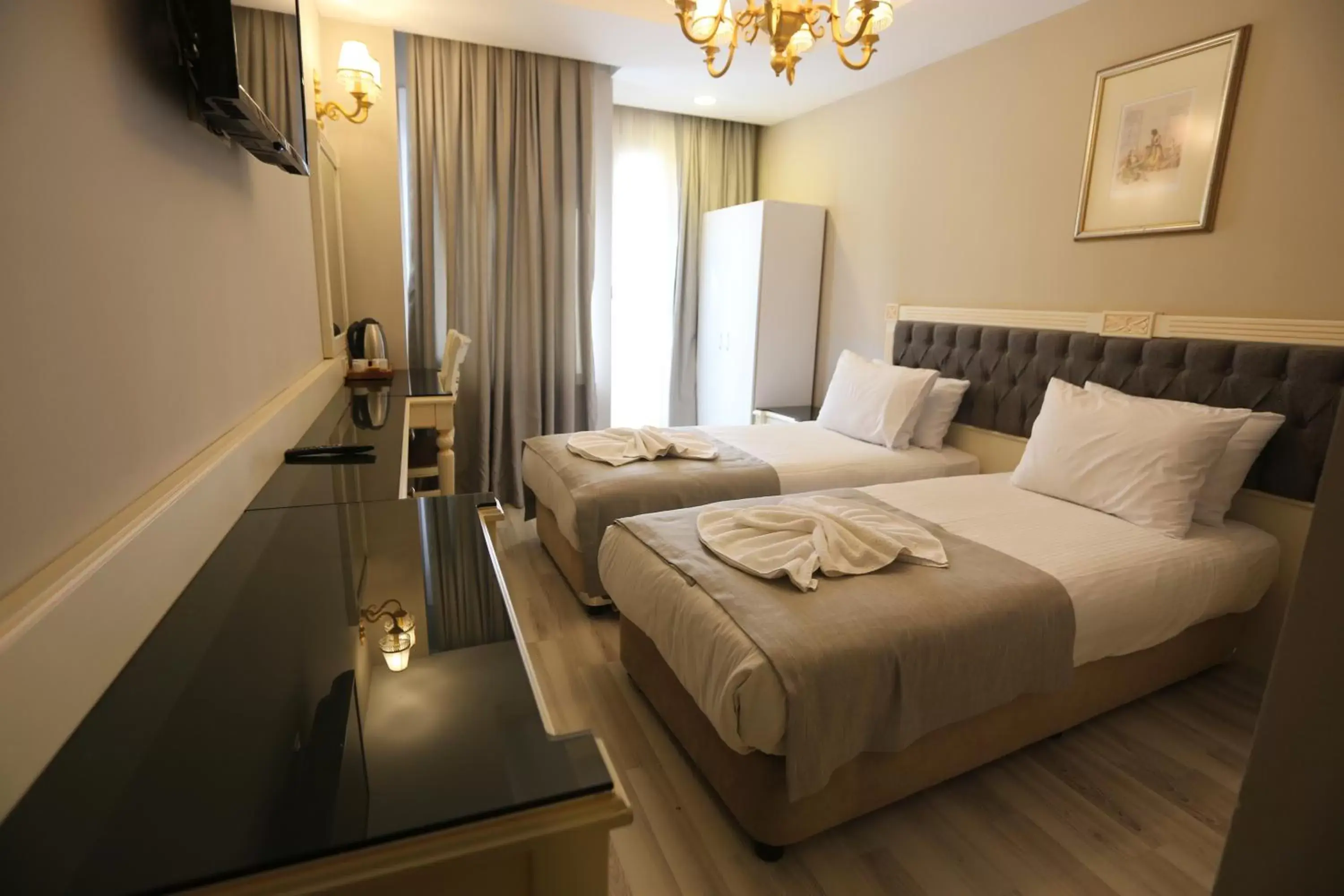Bed in Albatros Premier Hotel