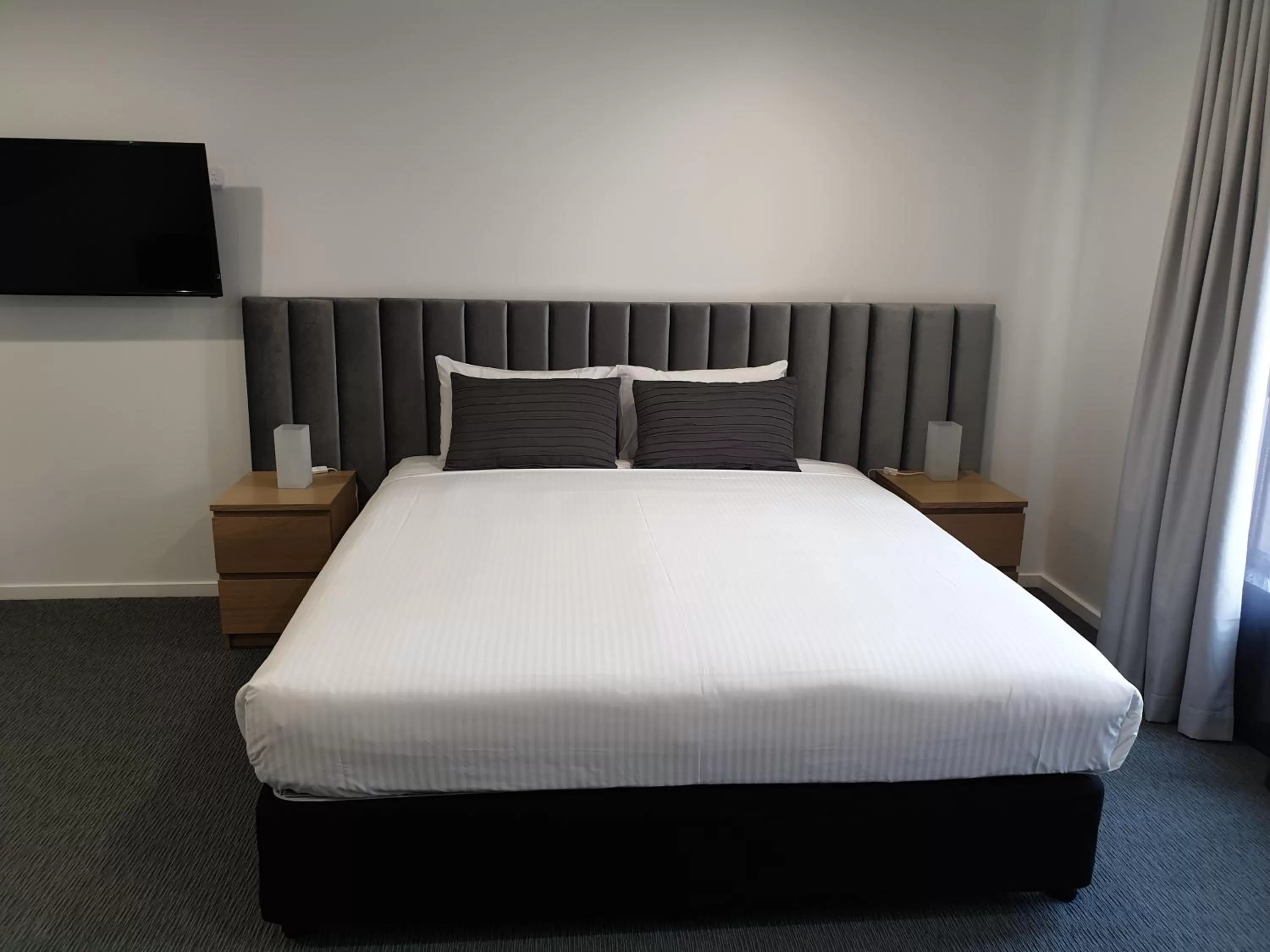 Bed in Twofold Bay Motor Inn