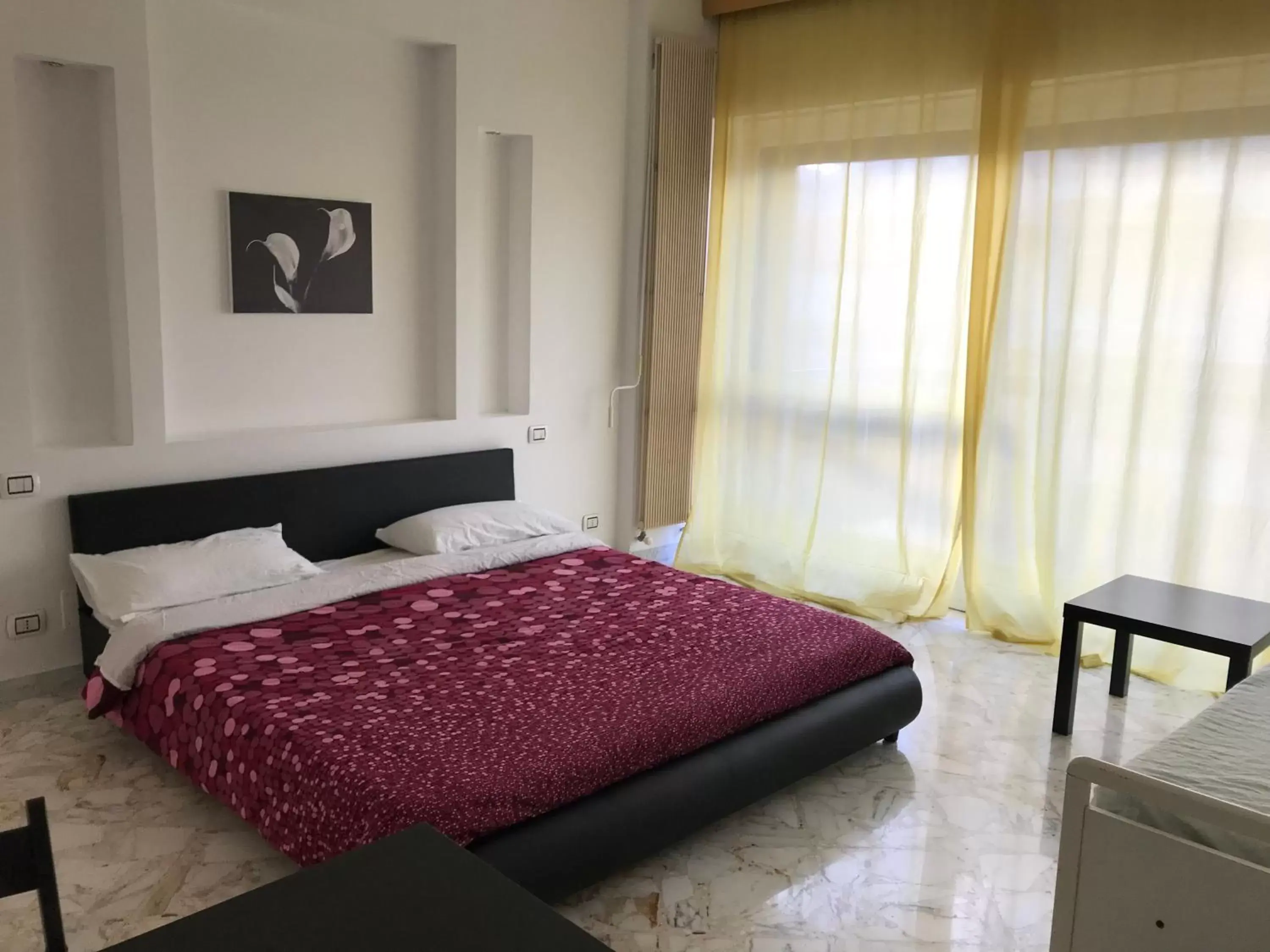 Bed in CAVOUR 124 -guest-room-