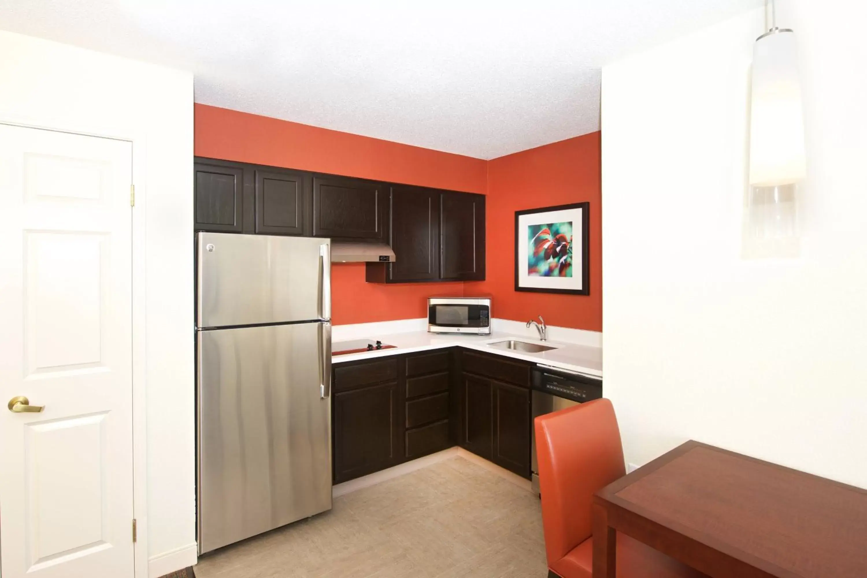 Bedroom, Kitchen/Kitchenette in Residence Inn by Marriott Evansville East