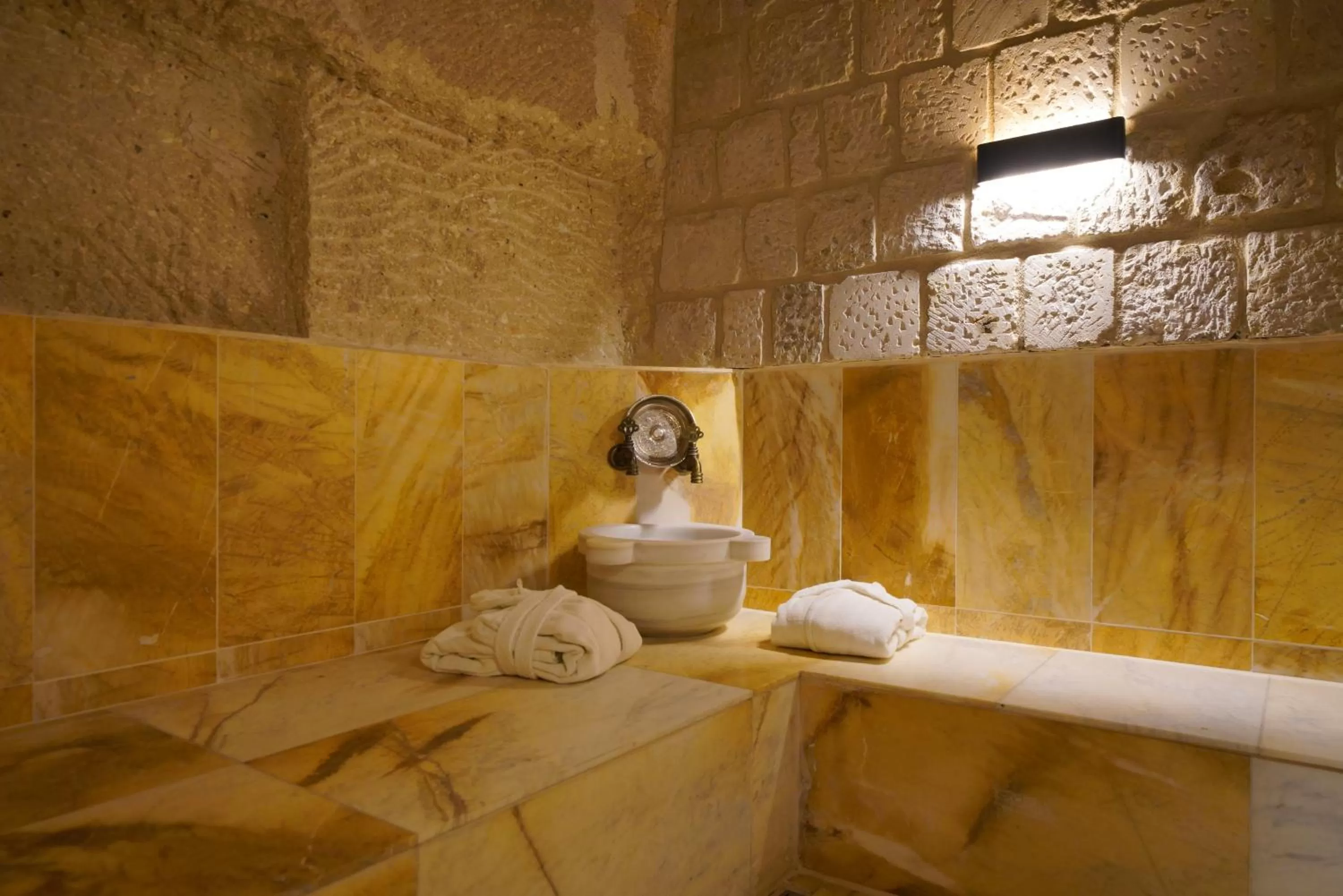 Public Bath in Shoestring Cave House