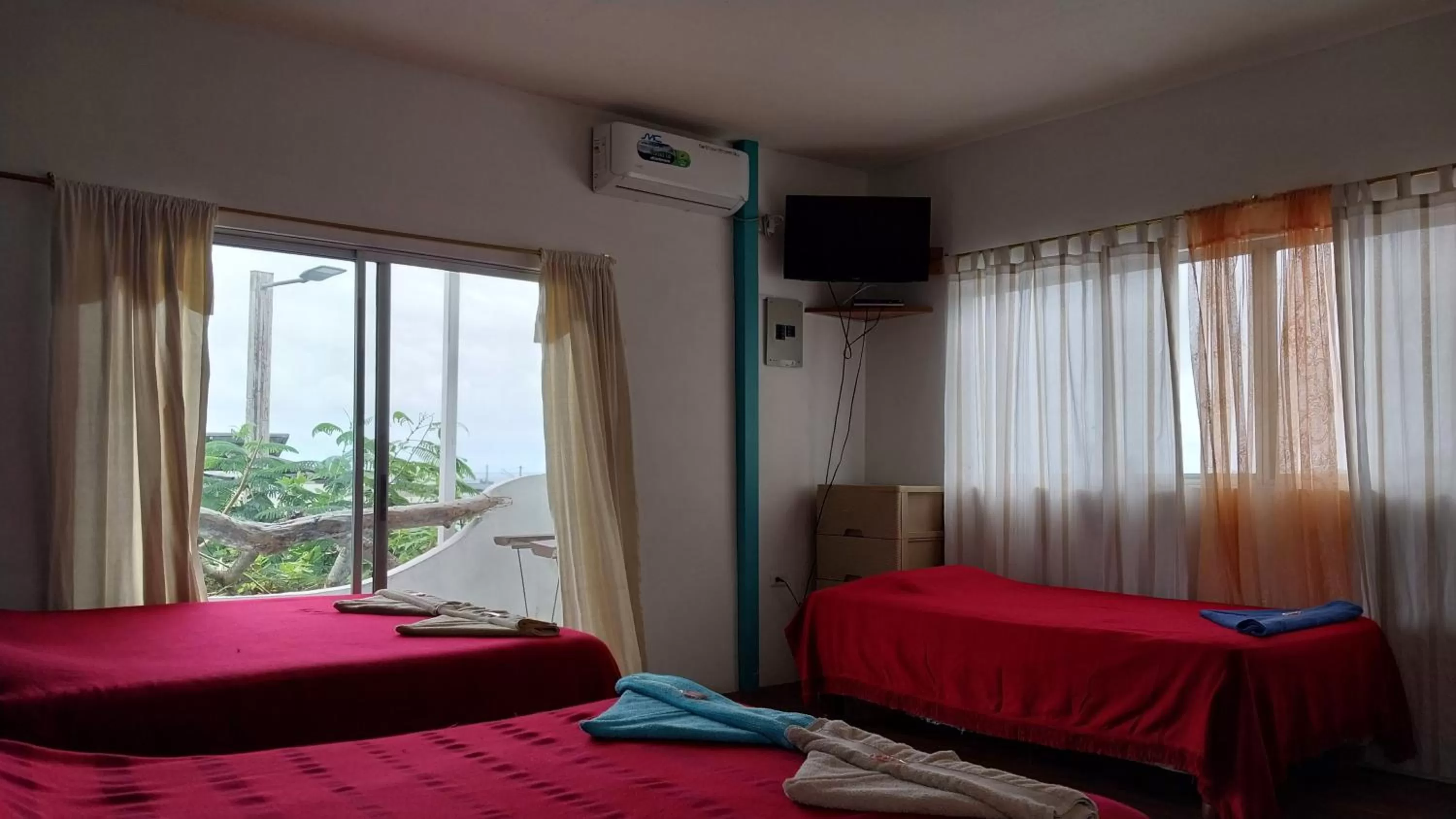 Bed in Hostal Cabañas Don Jorge