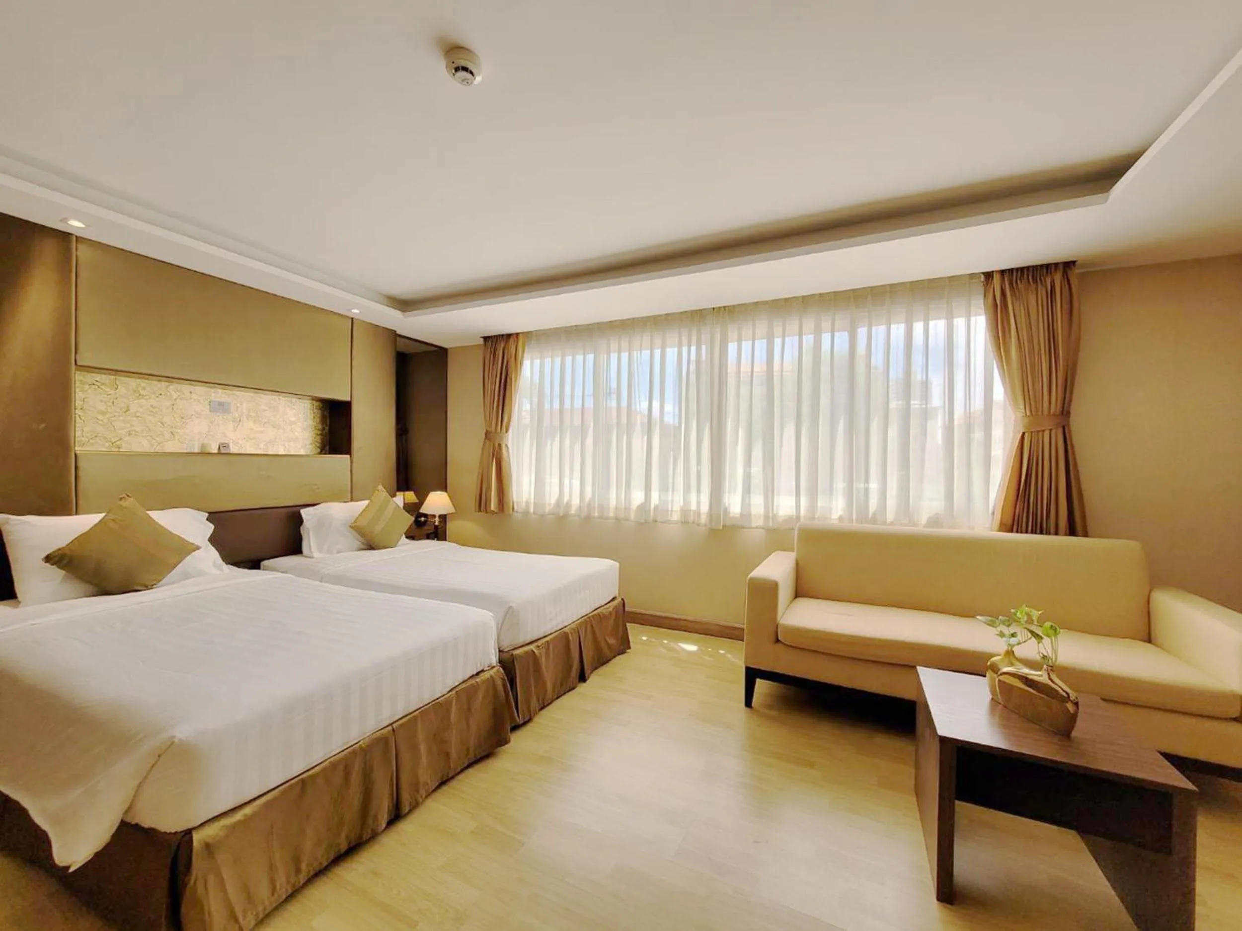 Bed in Nova Gold Hotel Pattaya