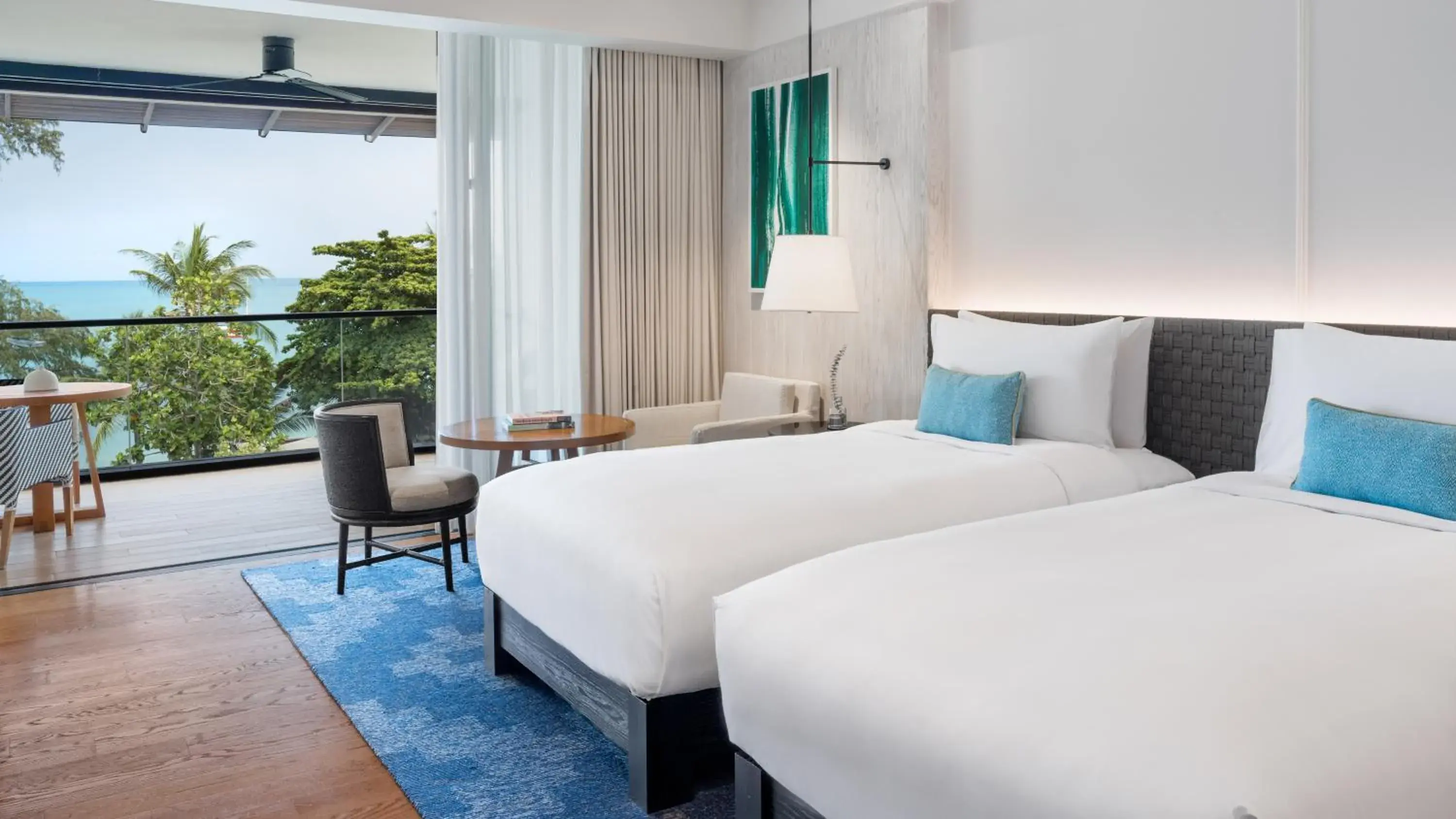 Bed in Kimpton Kitalay Samui, an IHG Hotel