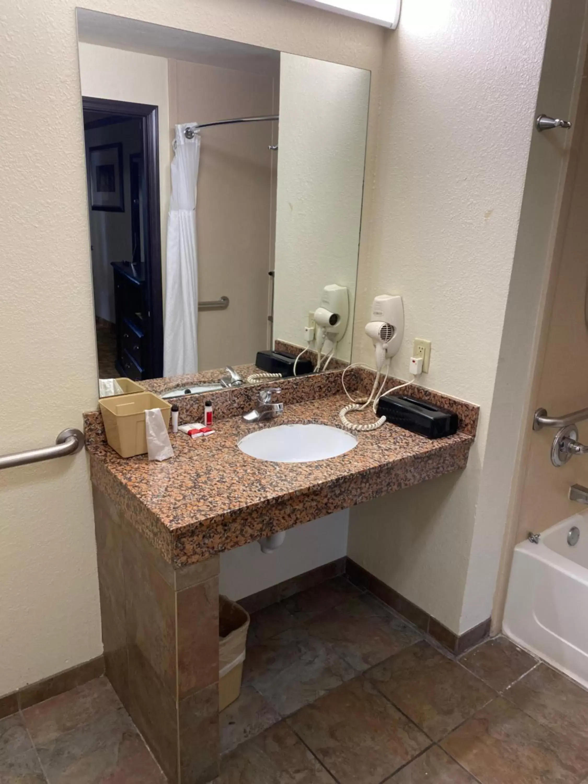 Bathroom in Days Inn by Wyndham Oklahoma City/Moore