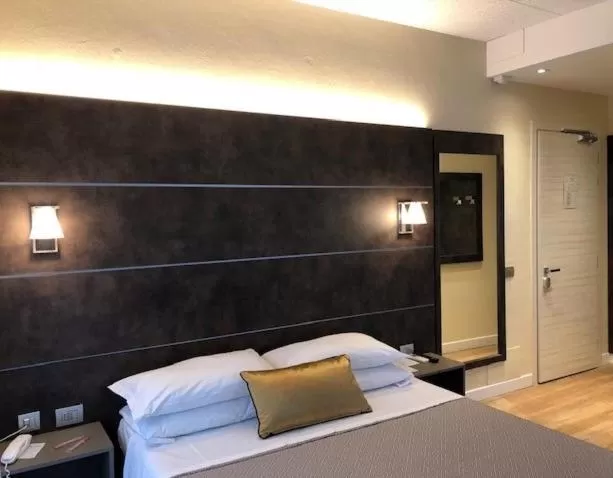 Bed in Hotel La Nuova Rotaia