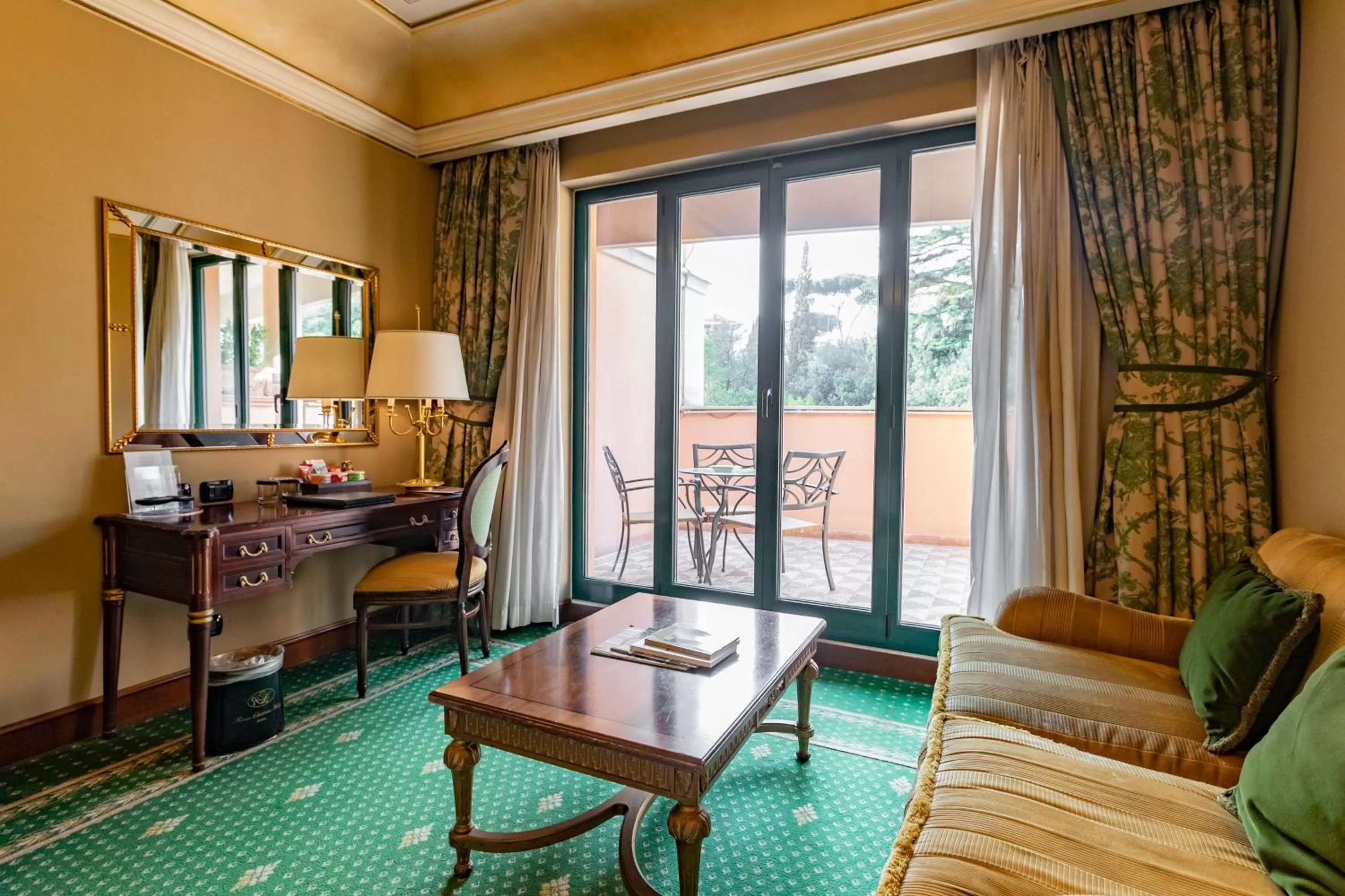 Seating area, Bed in River Chateau Hotel