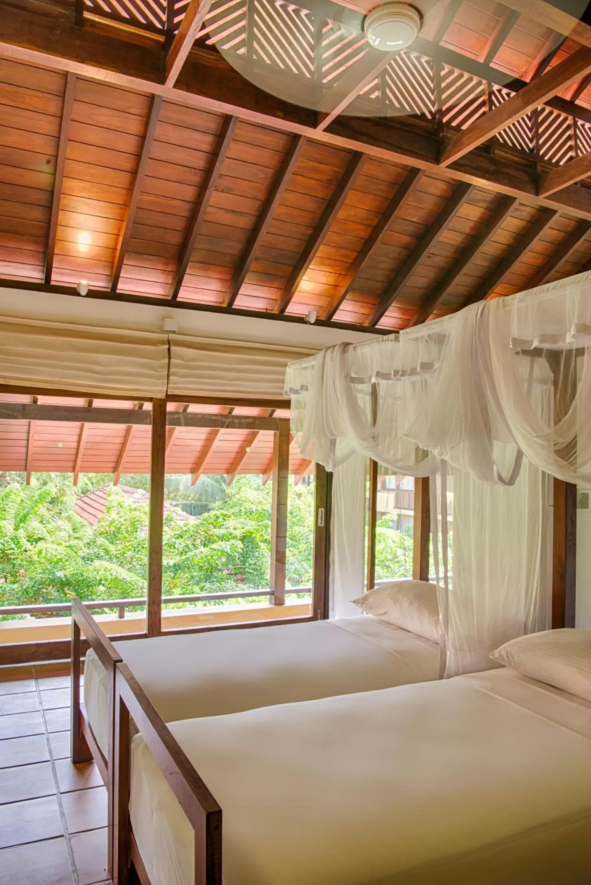 Bed in Jetwing Ayurveda Pavilions - Full Board & Treatments